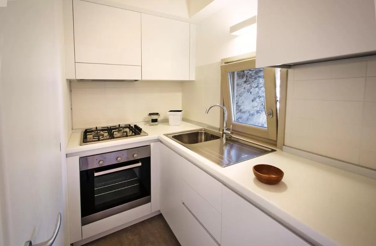Kitchen or kitchenette, Kitchen/Kitchenette in Albergo Diffuso Tolmezzo