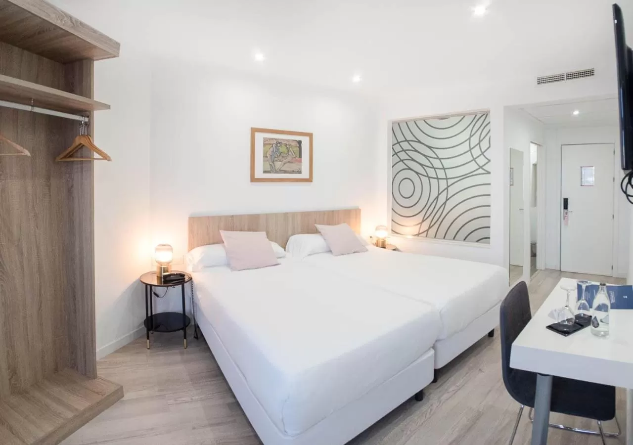 Bed in Hotel Pasarela