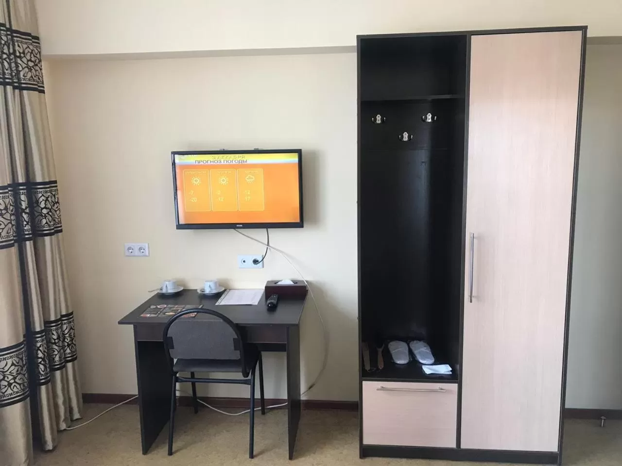 TV/Entertainment Center in Altai Business Hotel