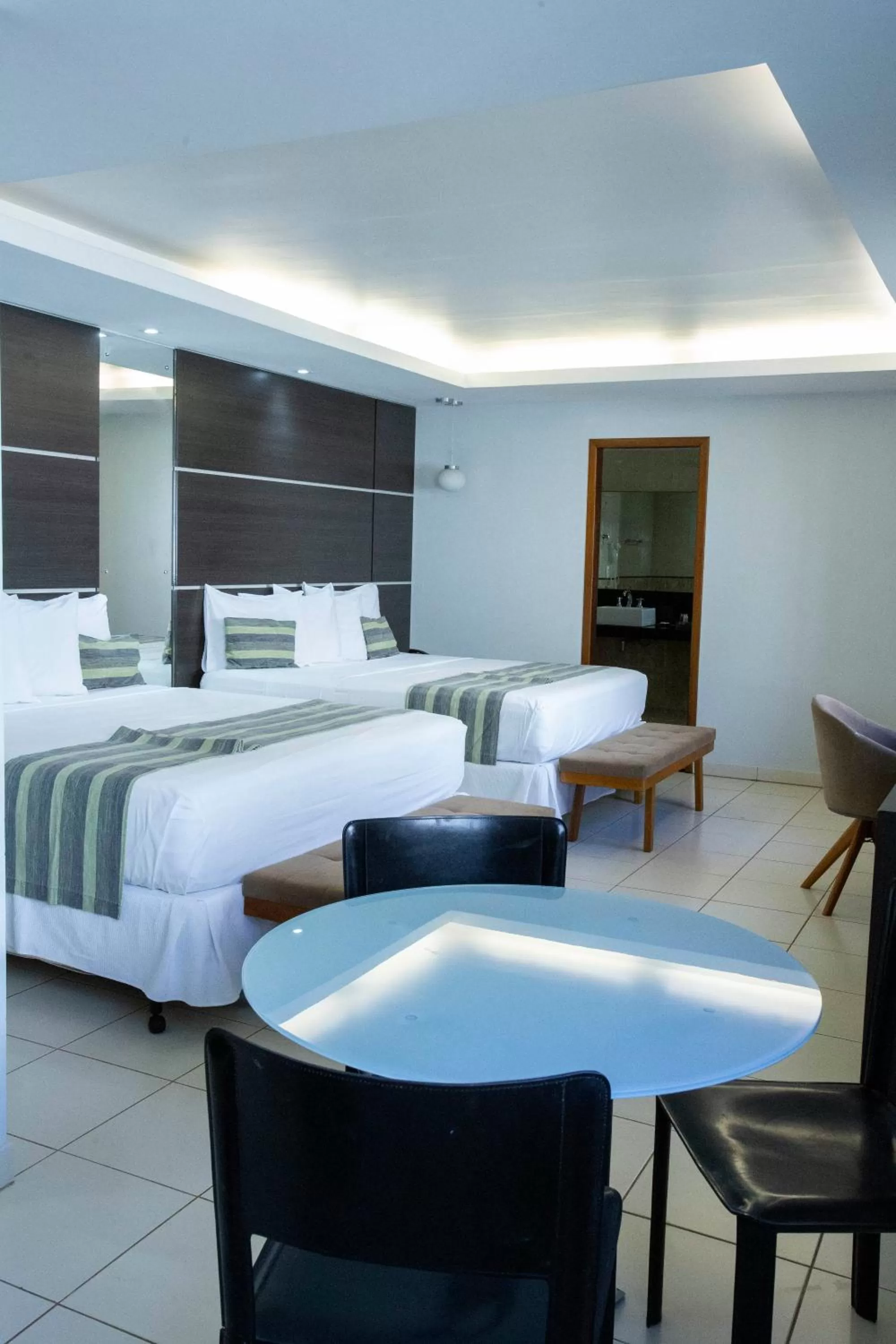 Bed in Atrium Confort Hotels