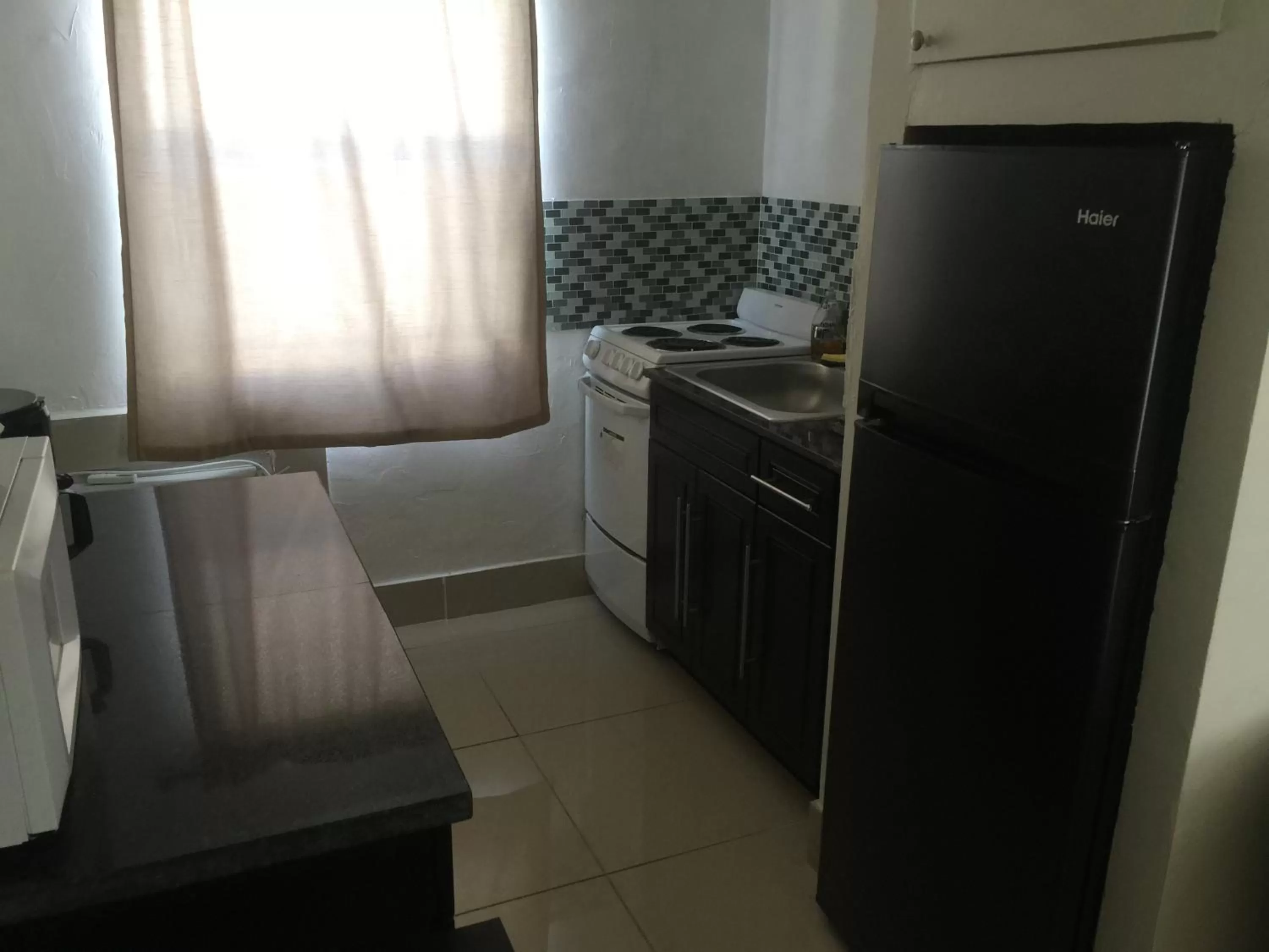 Kitchen or kitchenette in Pelican By The Sea