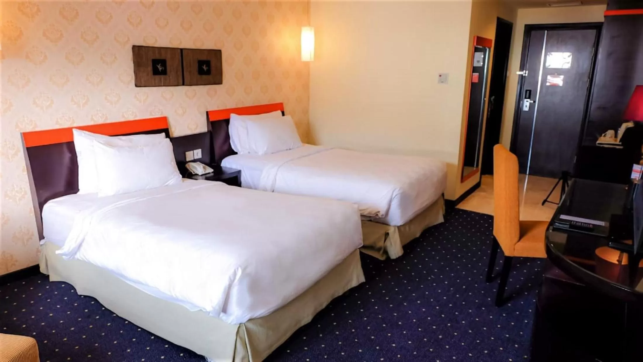 Bed in Swiss-Belhotel Silae Palu