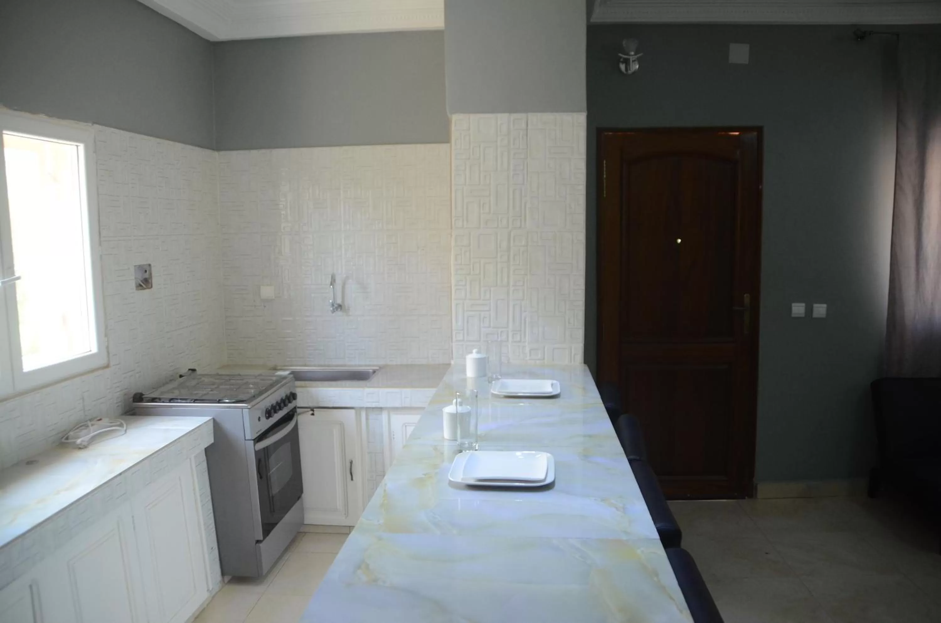 Kitchen/Kitchenette in Hotel La Perle