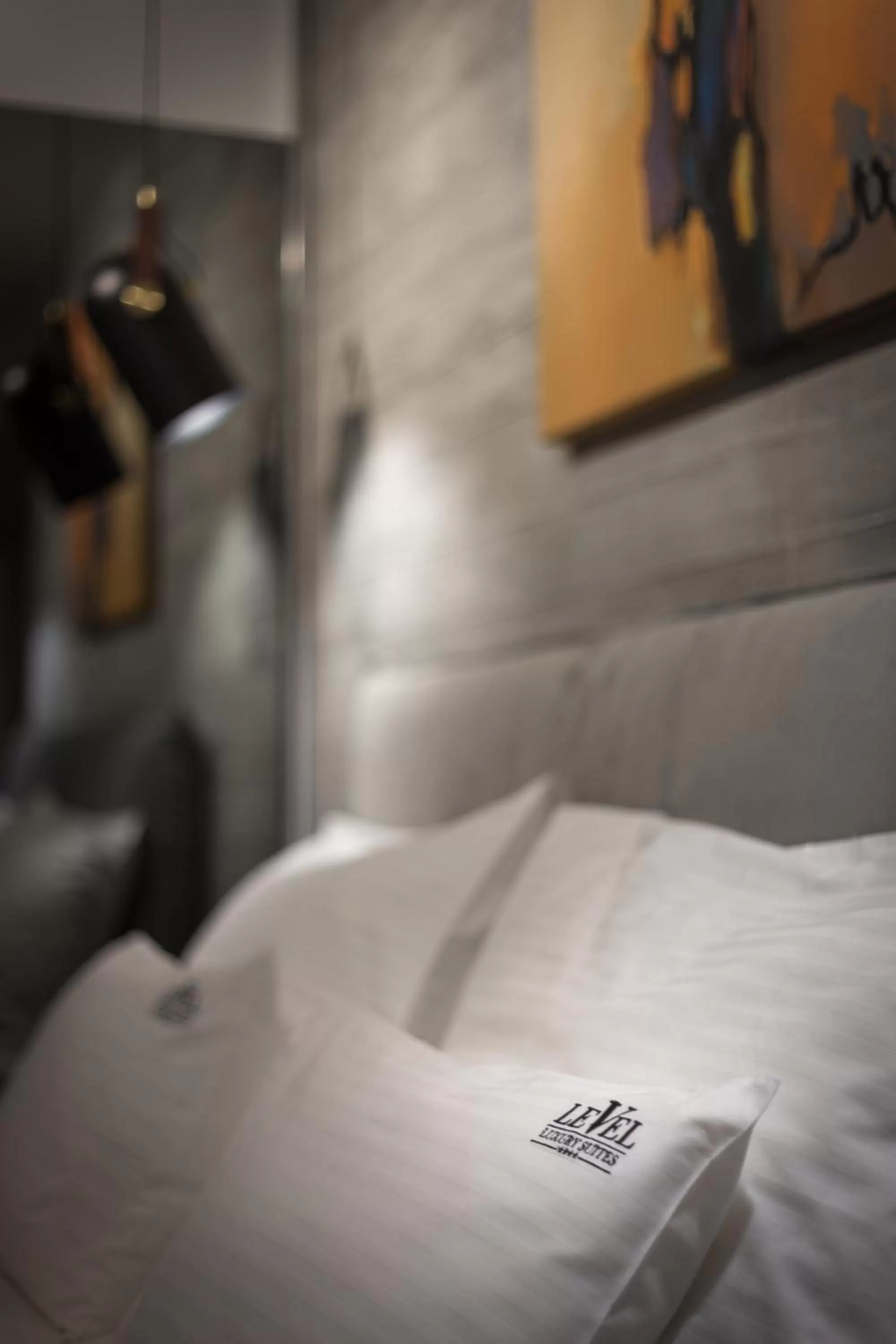 Bedroom, Bed in Level Luxury Suites