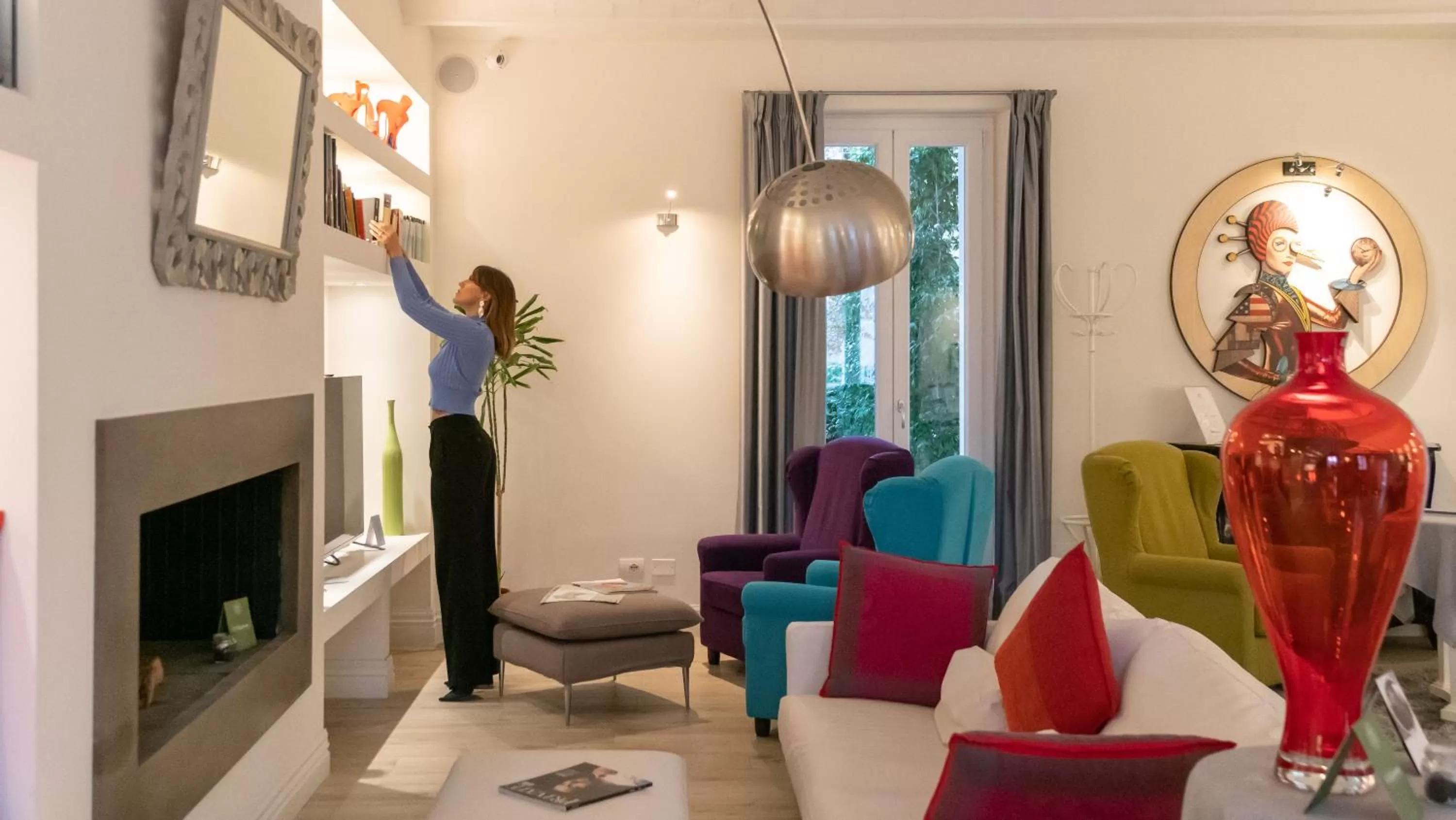 Communal lounge/ TV room in VILLA LIBERTY Boutique Hotel - Borgo Capitano Collection