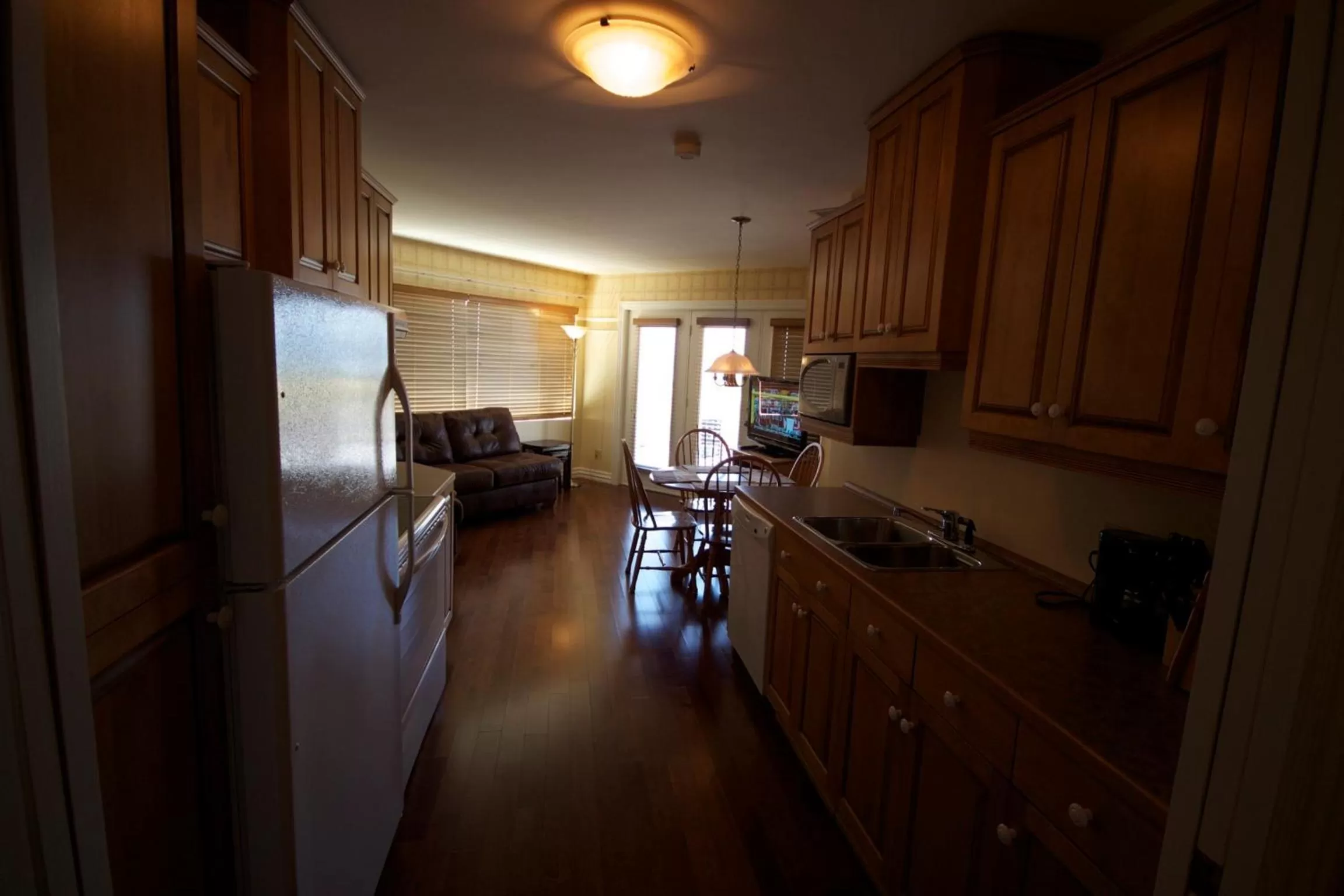 Kitchen or kitchenette in Hôtel Le Voyageur