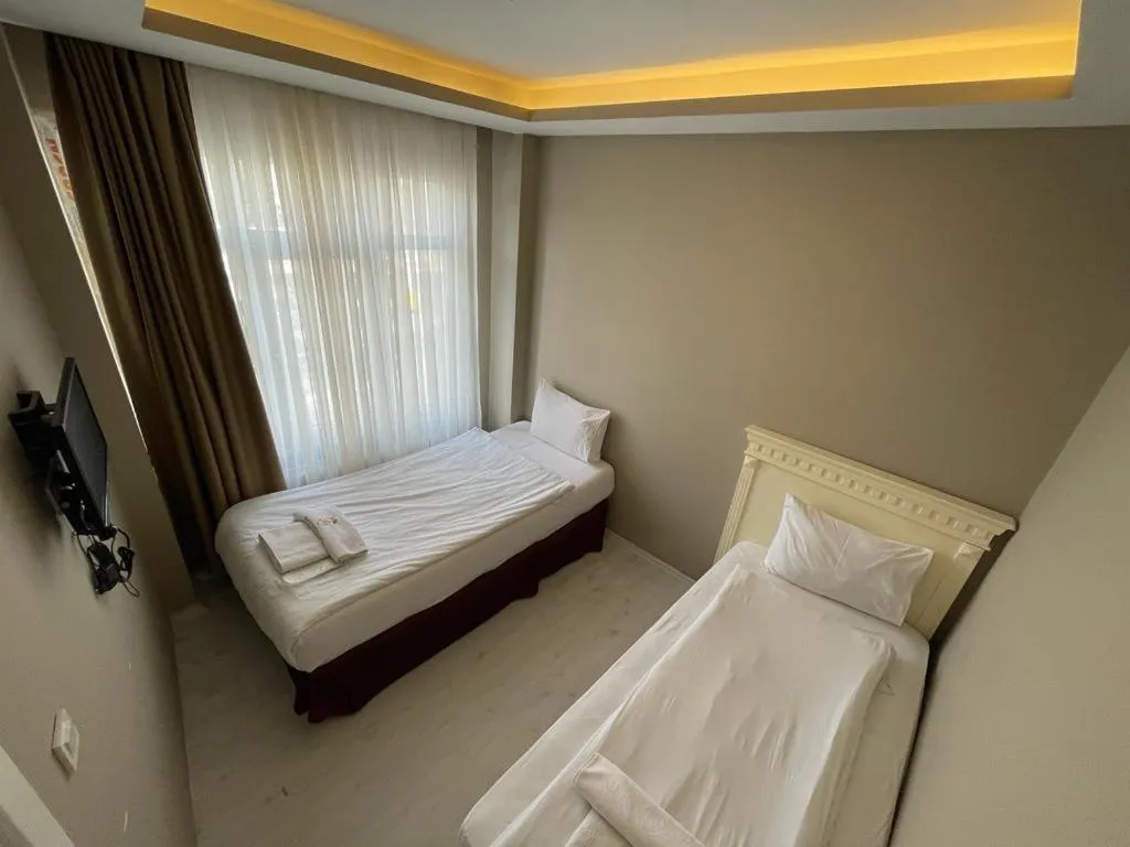 Bed in Golden Gate Hotel Topkapı