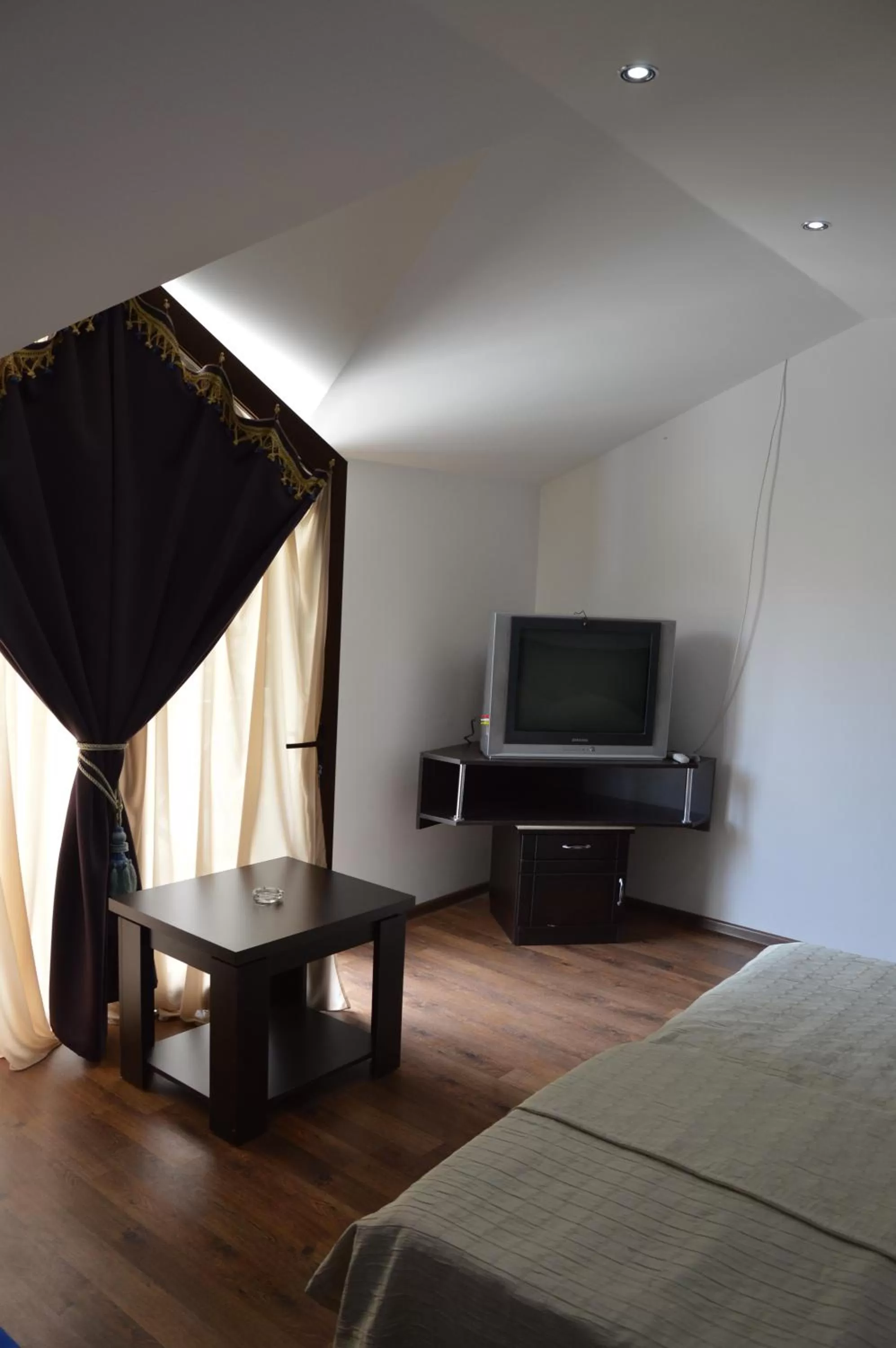 TV and multimedia, TV/Entertainment Center in Hotel Bagineti