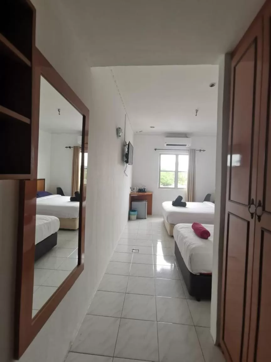 Bed in THE ZULEY HERITAGE HOTEL