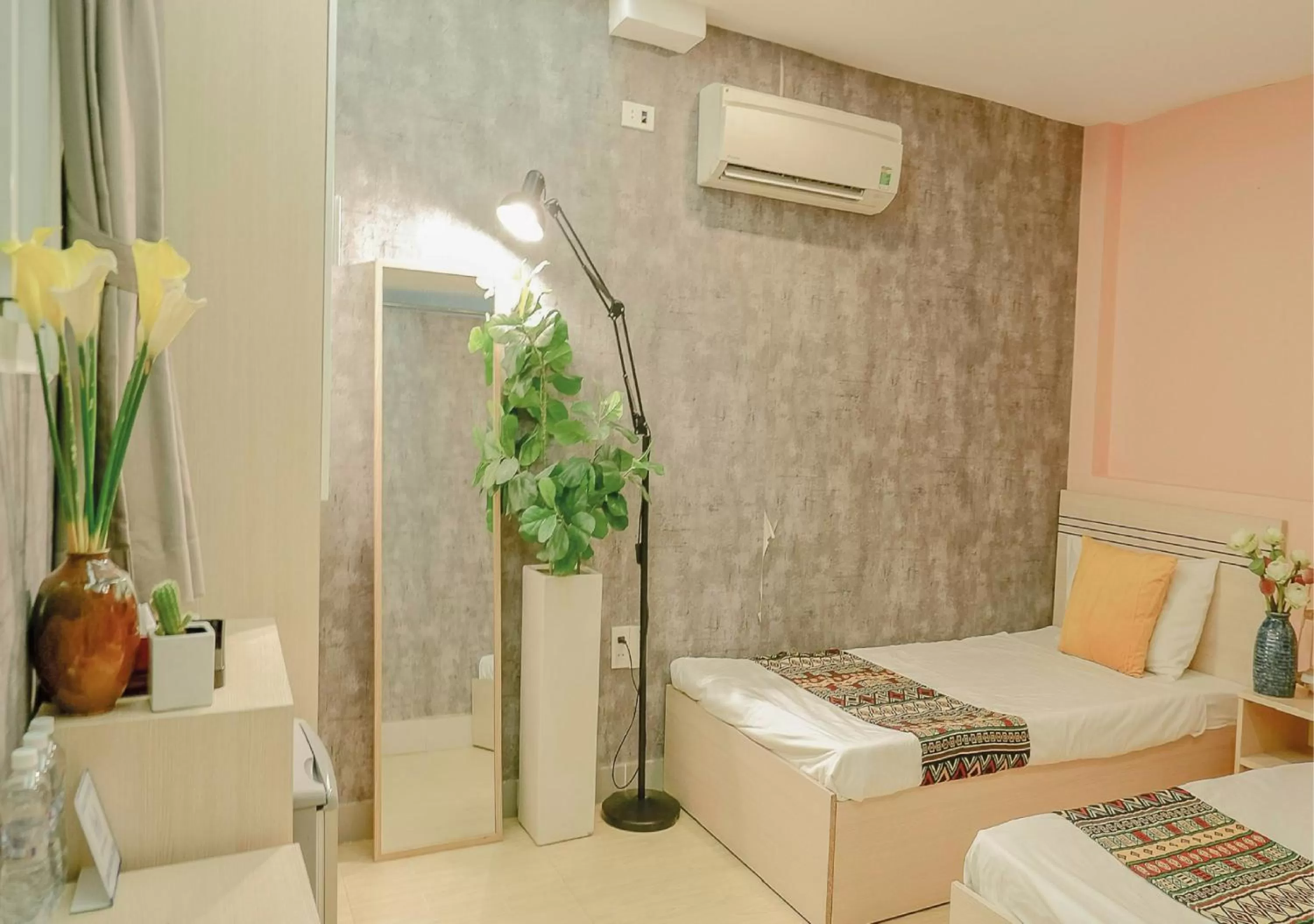 Bed in Galaxy Boutique Sai Gon Central Hotel