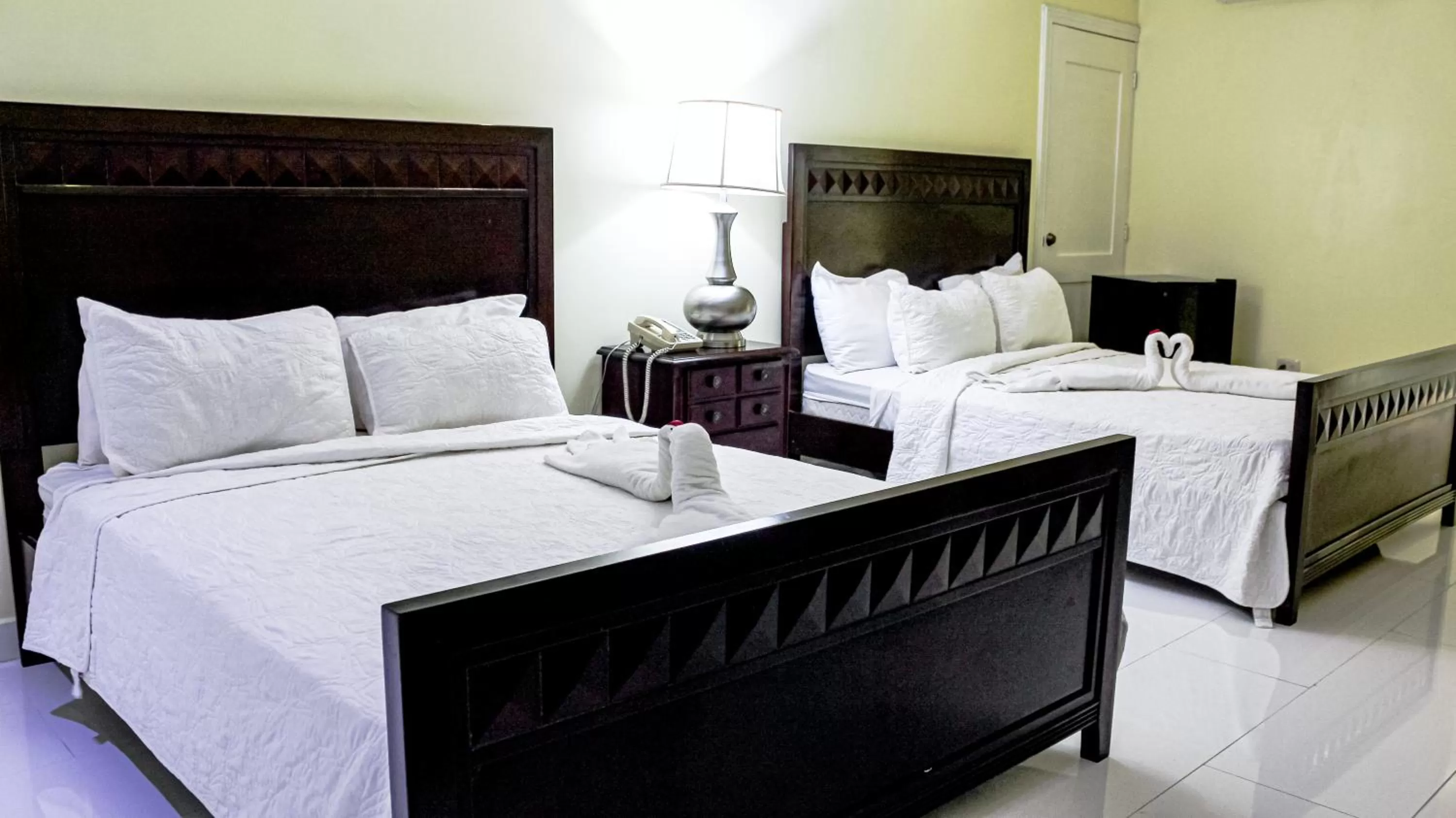 Bed in Golden House Hotel & Convention Center