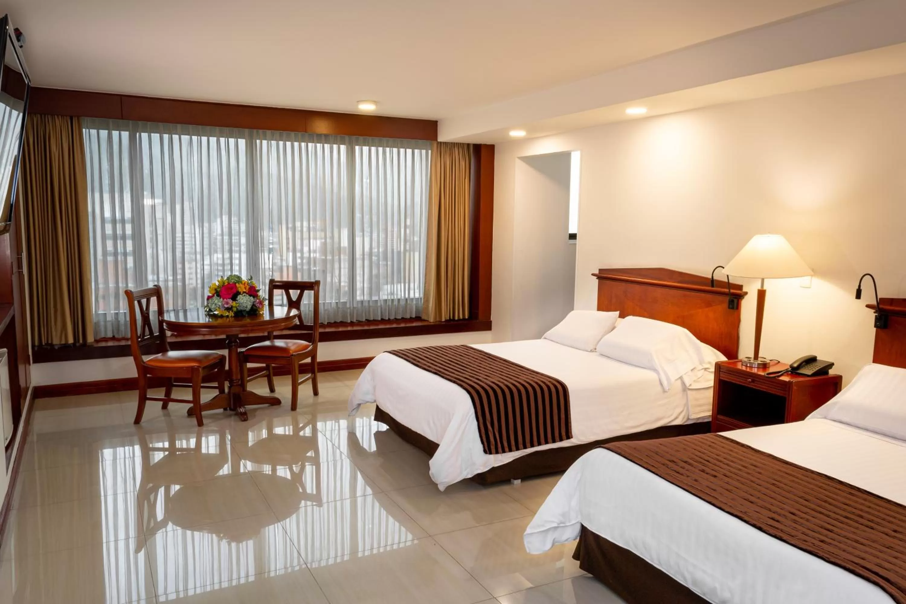 Bed in Torre de Cali Plaza Hotel