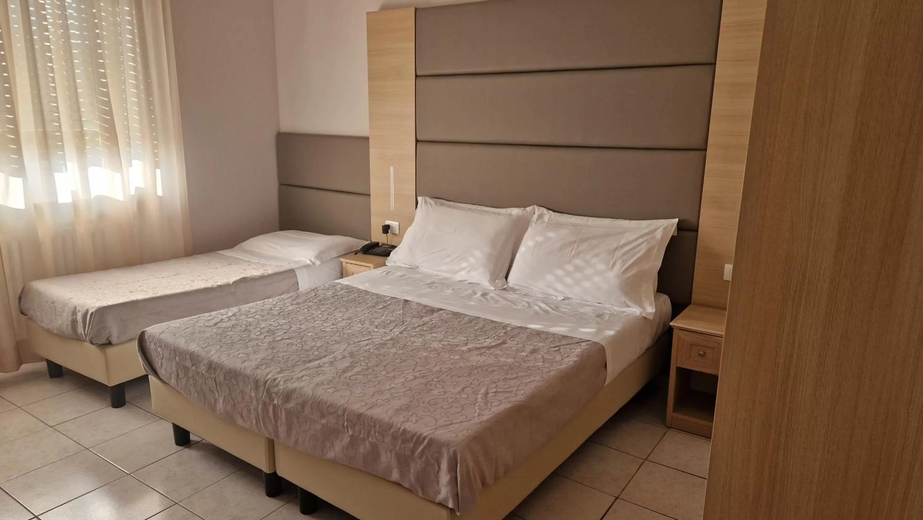 Bed in Hotel Trasimeno Bittarelli