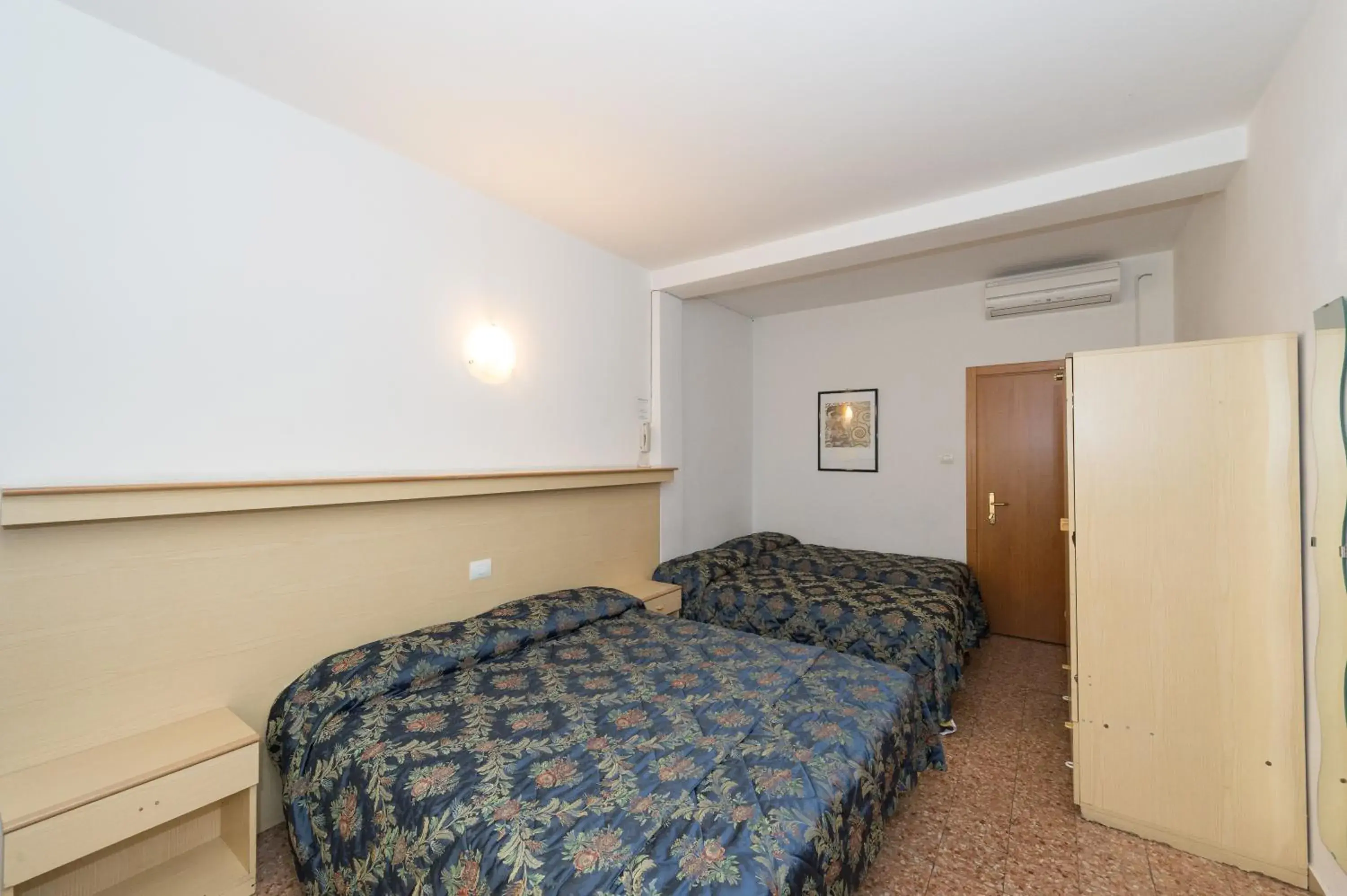 Quadruple Room with Balcony in Hotel Primo Quadruple Room with Balcony in Hotel Primo