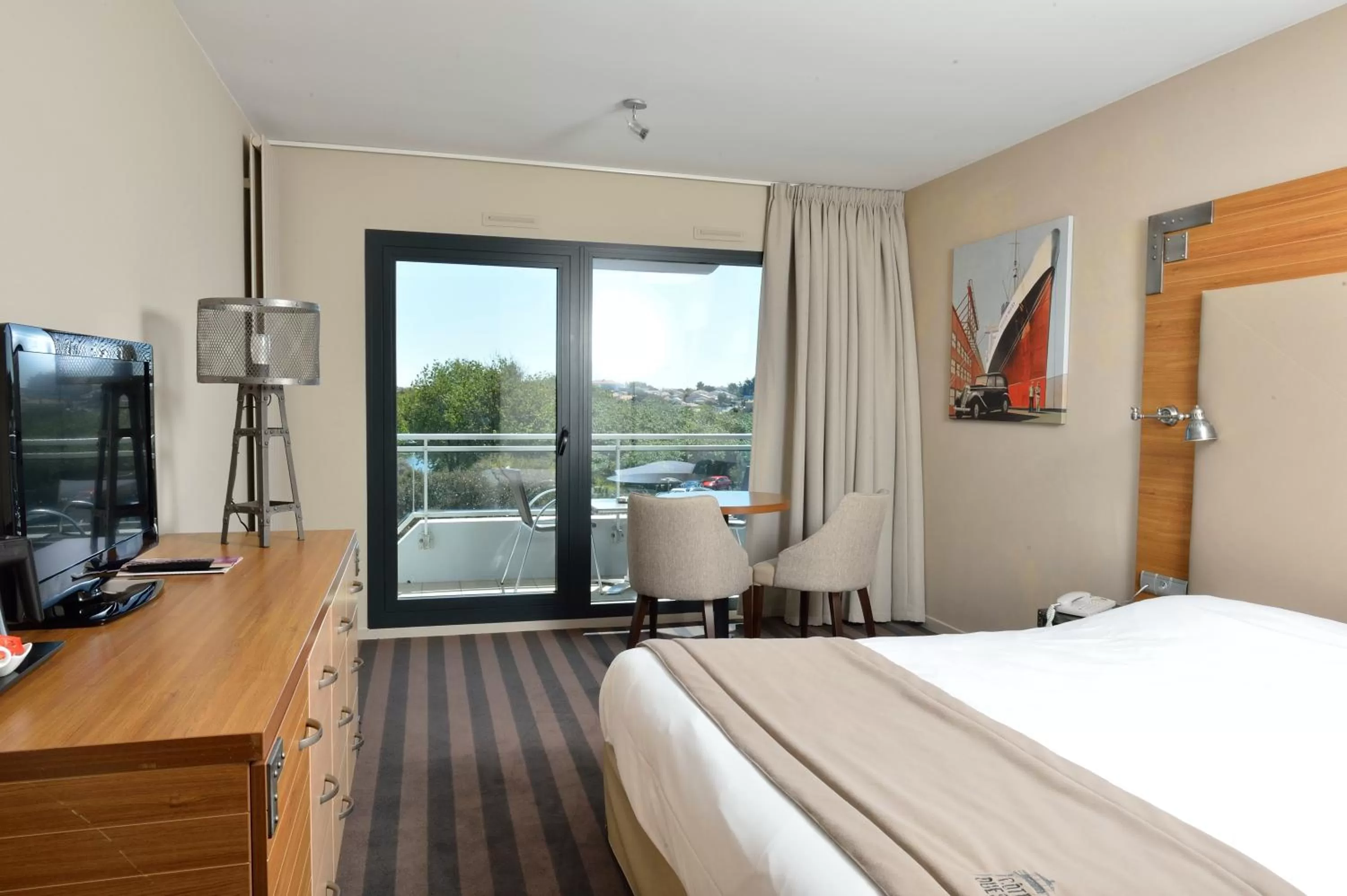 Photo of the whole room, Bed in Côte Ouest Thalasso & Spa Les Sables d'Olonne - MGallery Collection