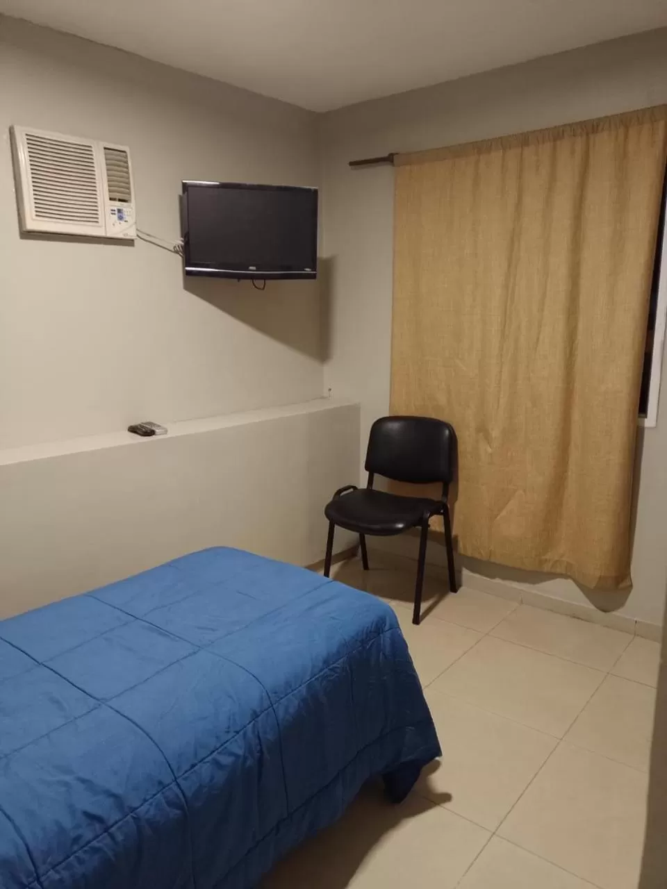 TV/Entertainment Center in Lorenzo Suites Hotel