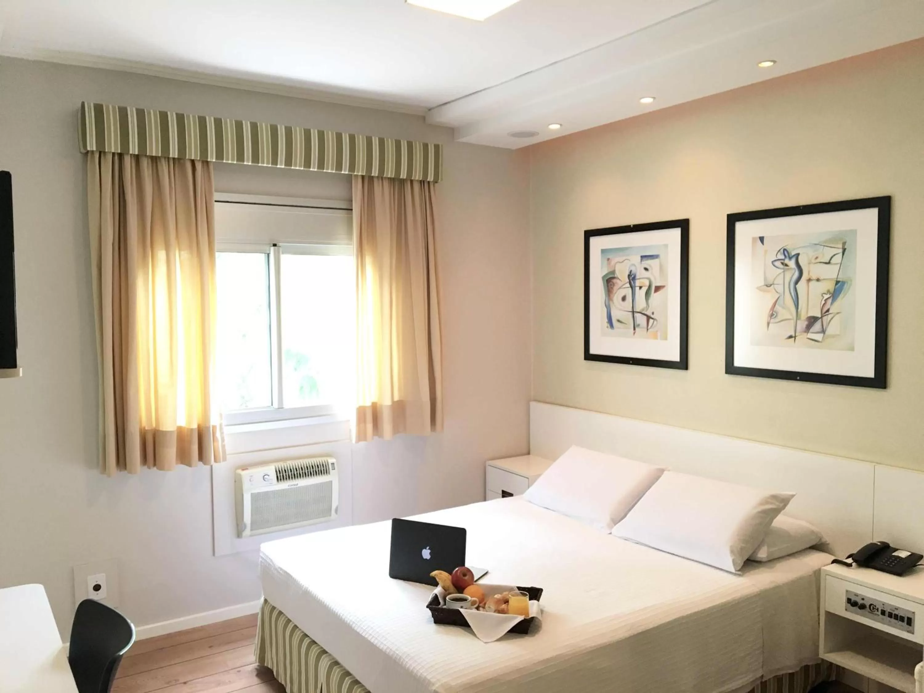 Bed, Seating Area in Cosmos Hotel