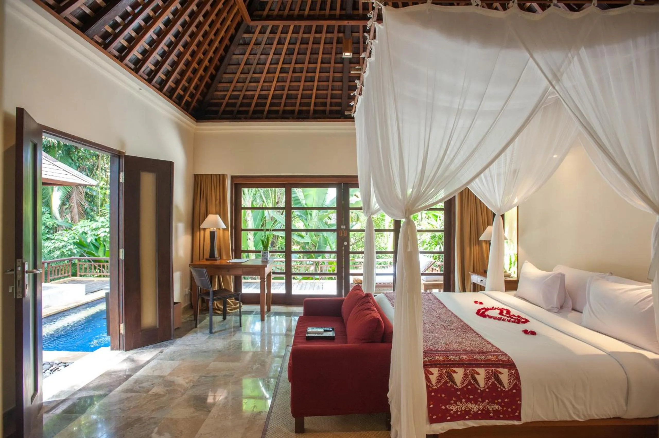 Photo of the whole room, Bed in Komaneka at Monkey Forest Ubud