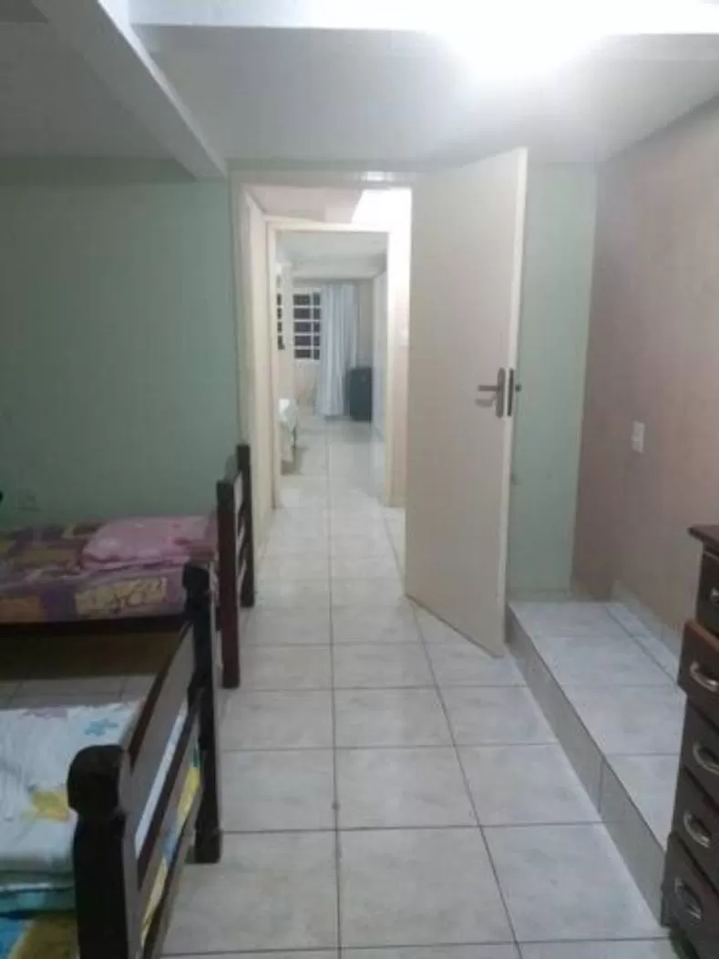 Bed in Pousada do Ribeirão