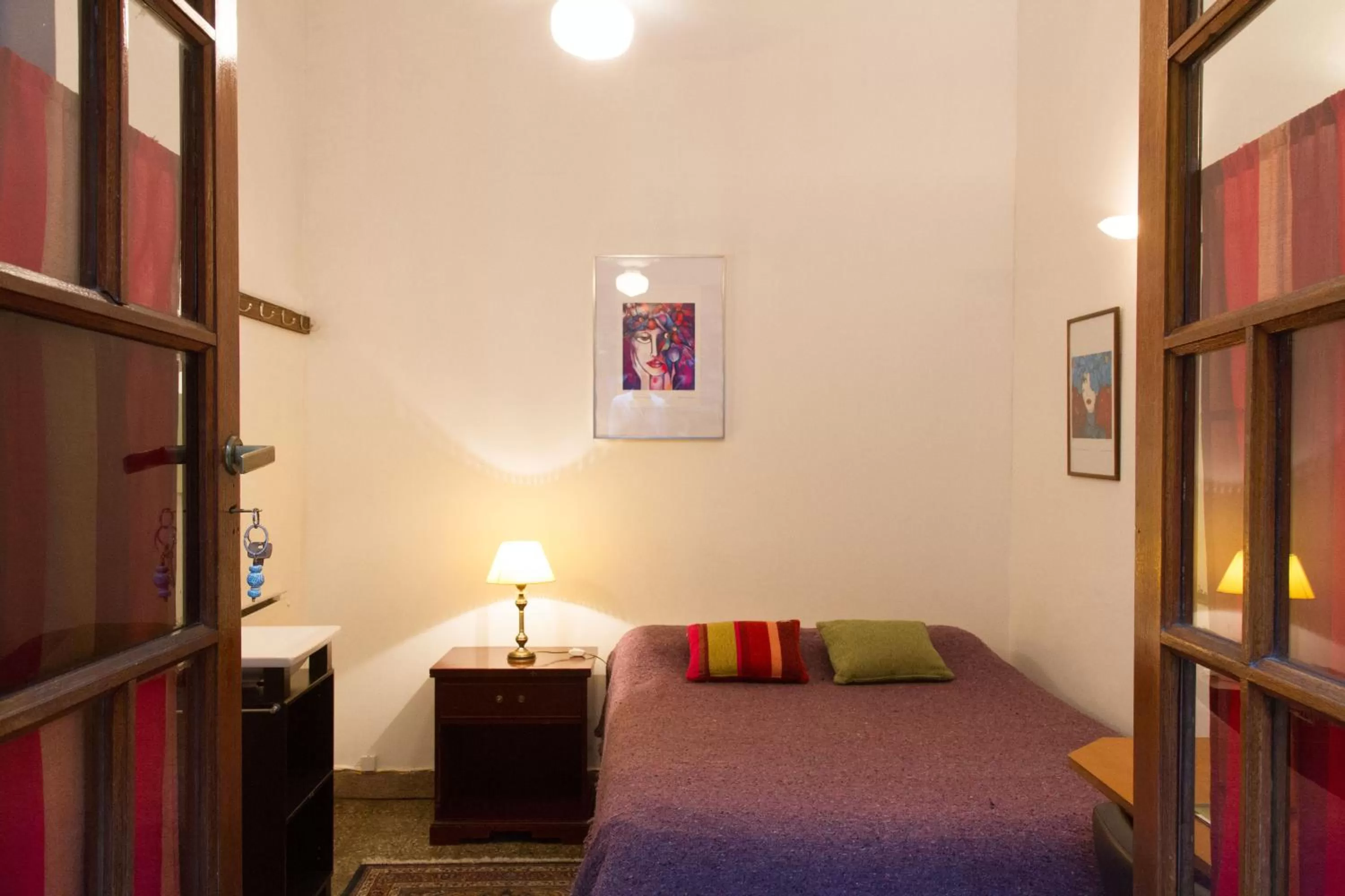 Bed in Lina's Tango Guesthouse