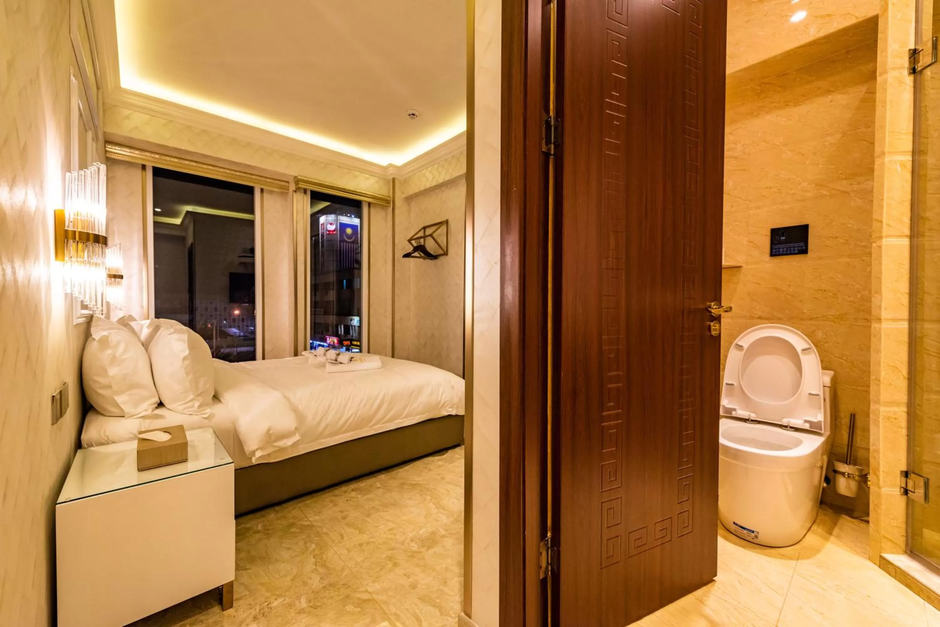 Bathroom, Bed in AC Residence - Behind Cititel Hotel