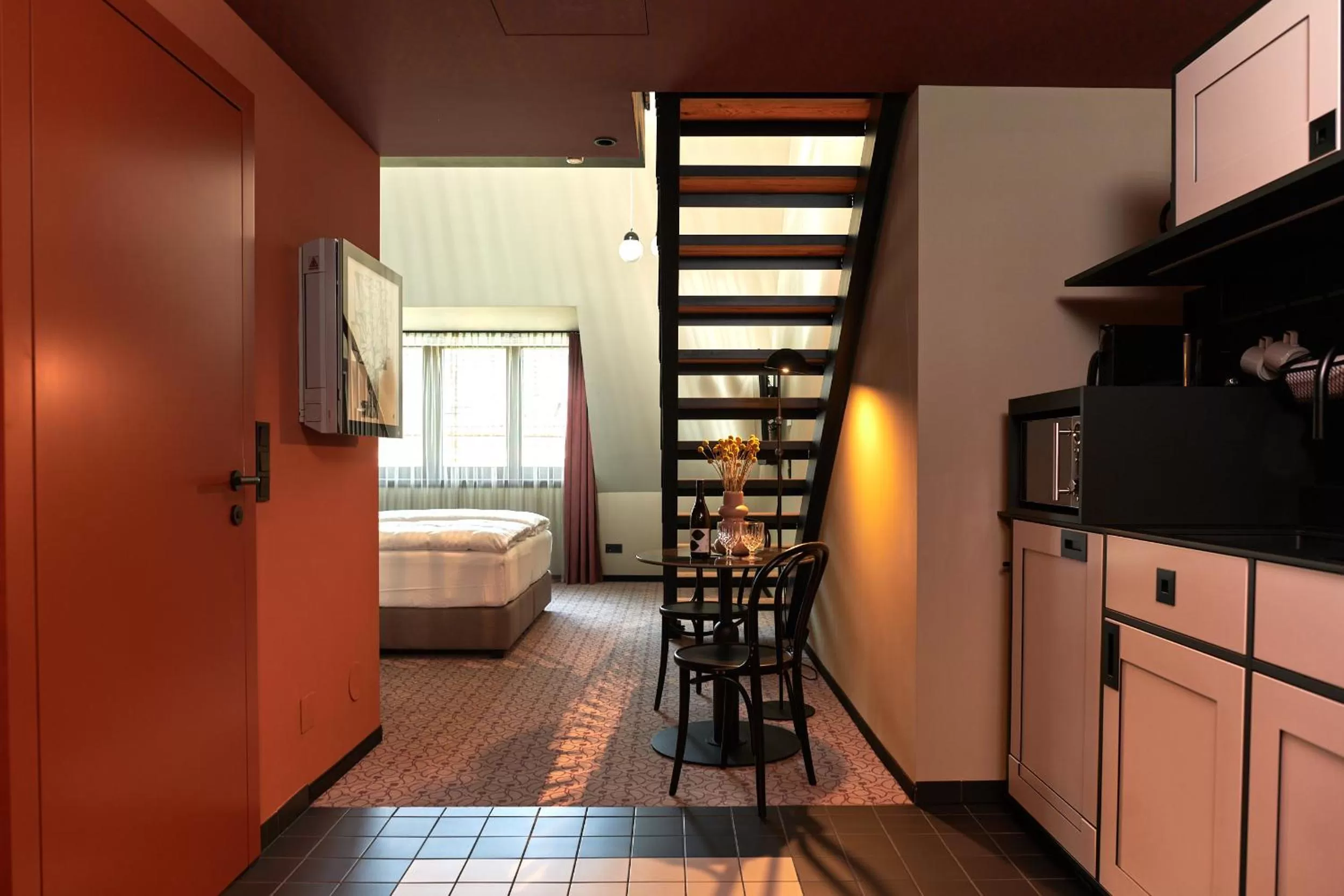 kitchen, Bed in WELTWIEN Luxury Art Apartments & Free Parking