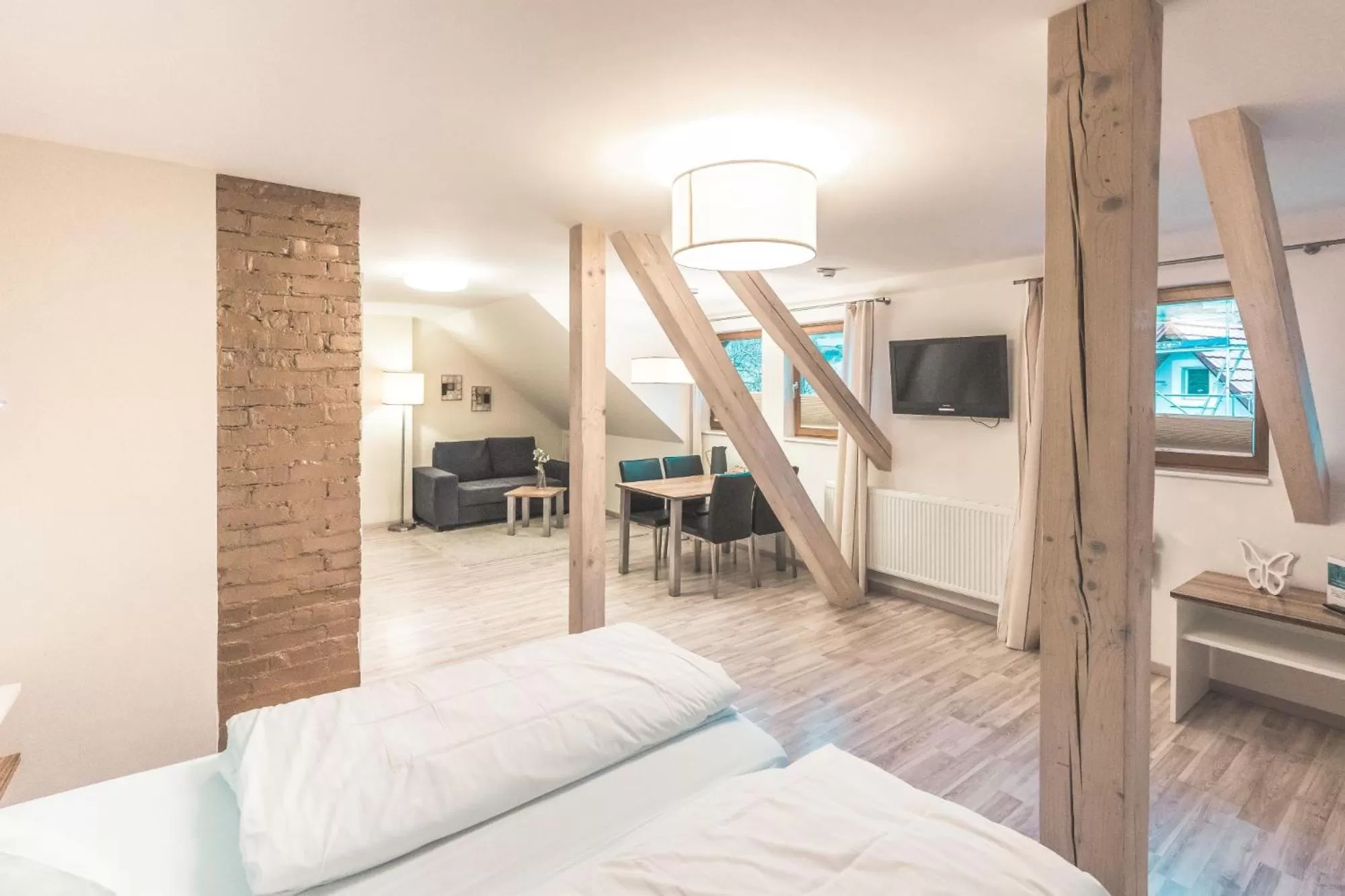 Bed, Seating Area in Wohlfühlhotel Landmann