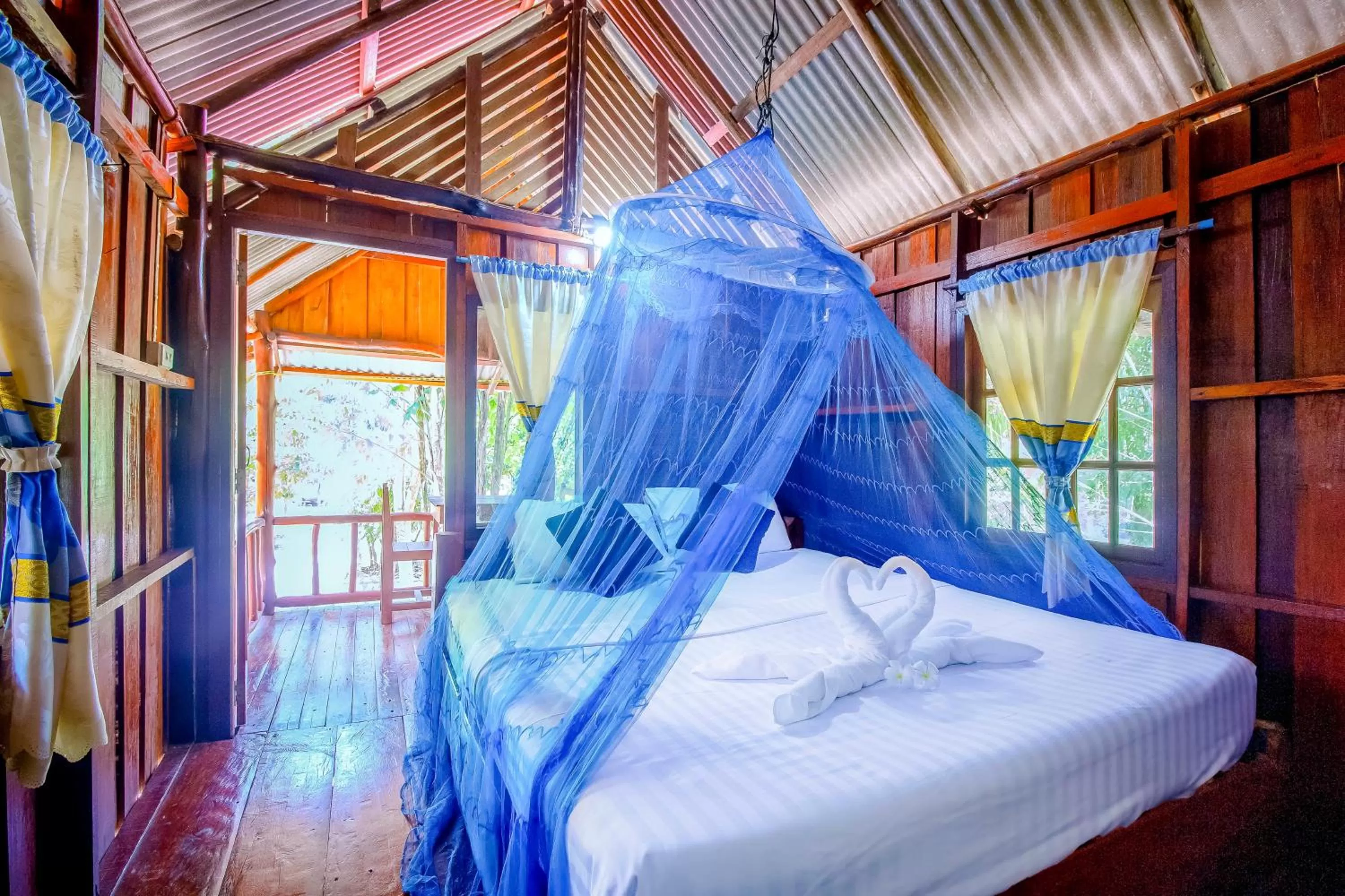 Bed in Khao Sok Palmview Resort