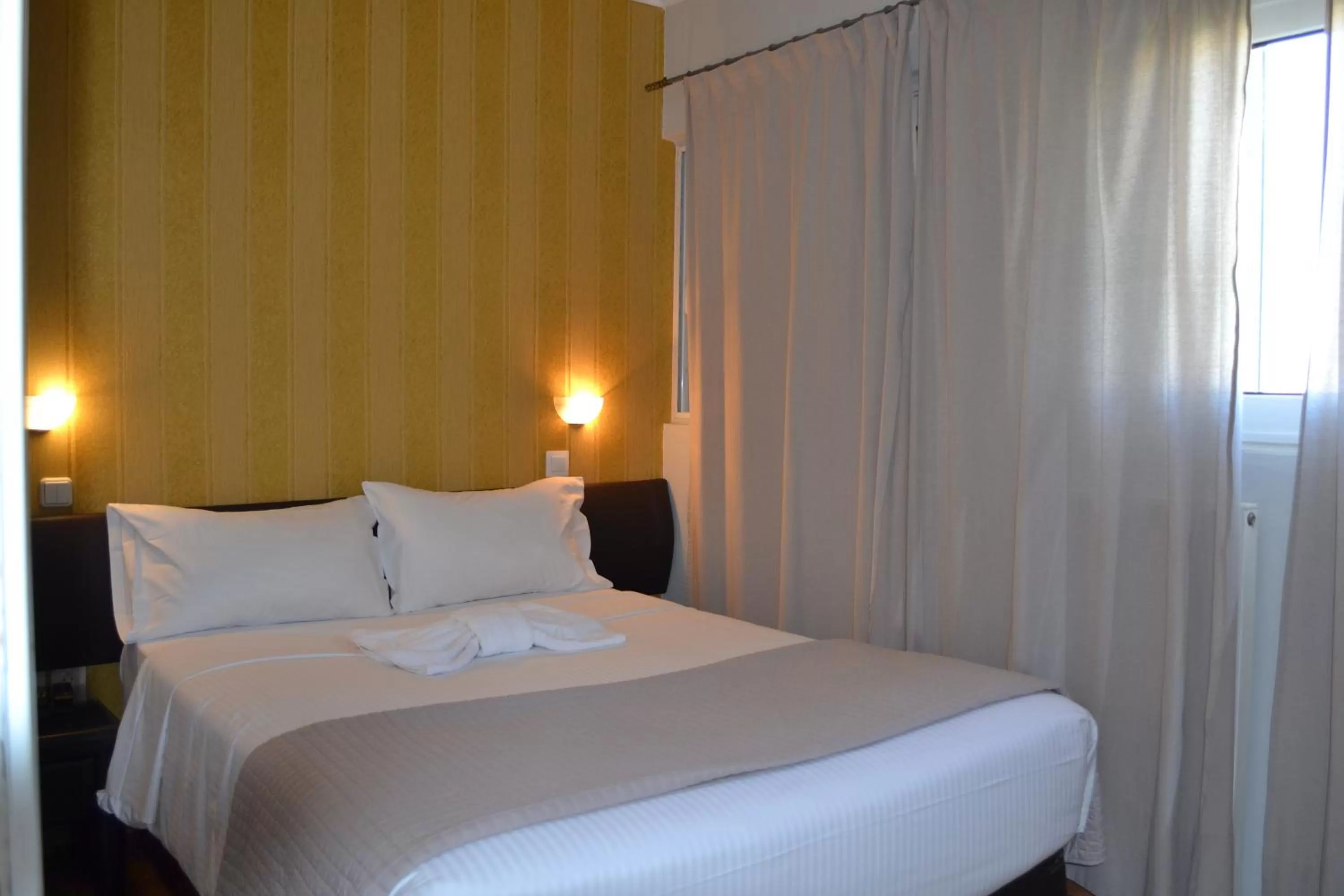 Bed in Rivitel Marousi Apartments