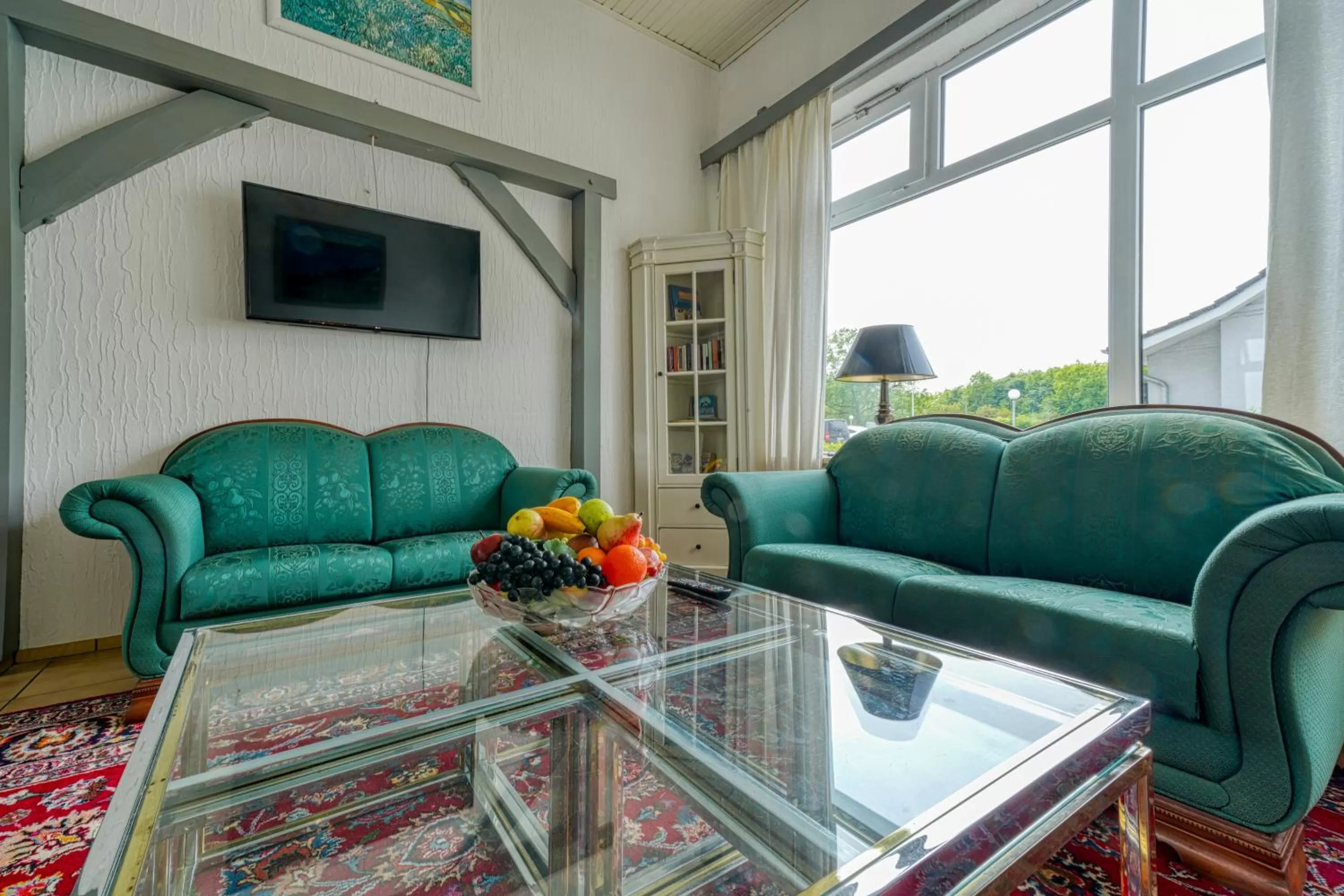 Communal lounge/ TV room in Hotel Seeblick Försterhaus