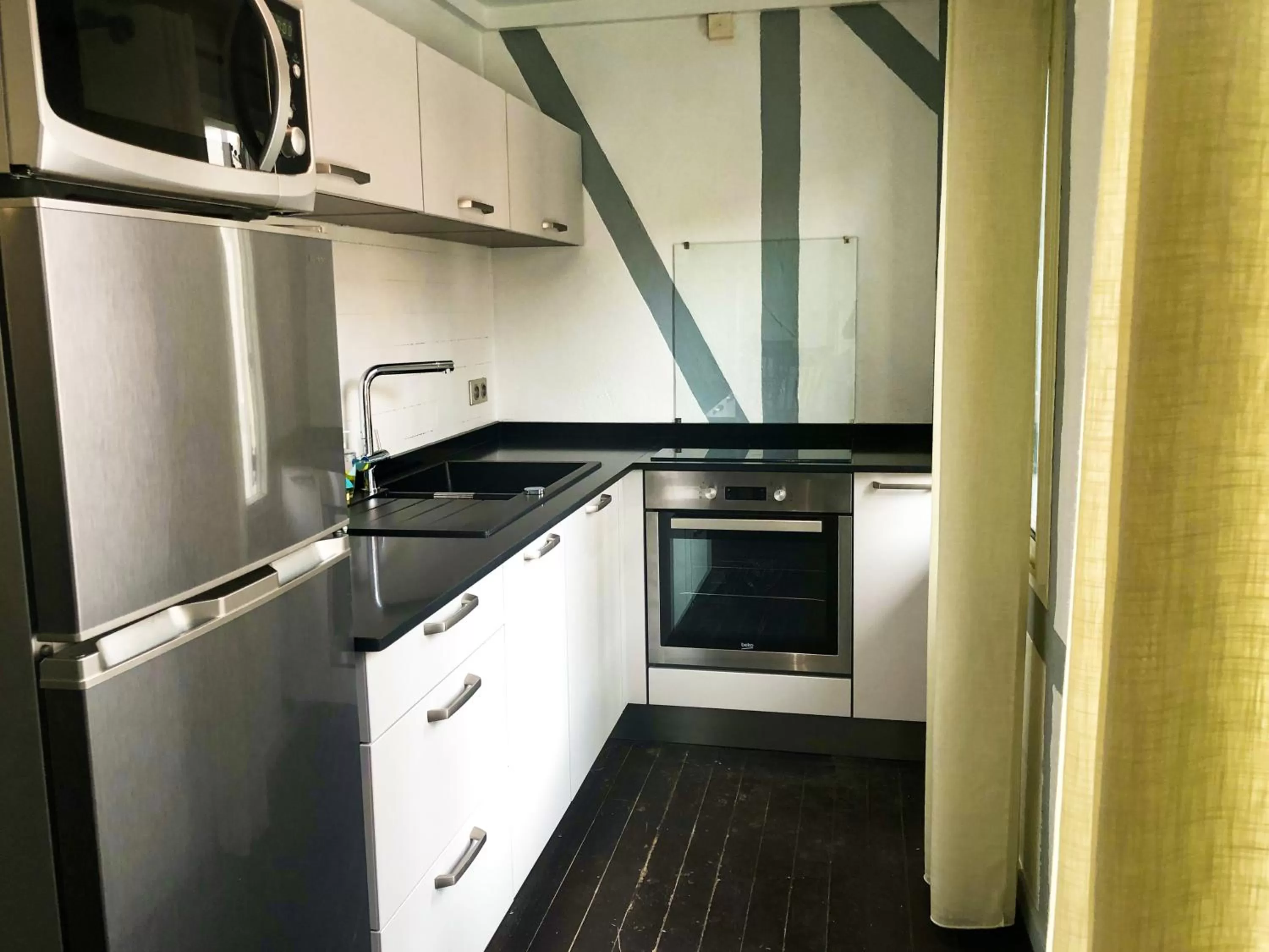 Kitchen or kitchenette in Eclipse Belle Etoile Appart'hôtel