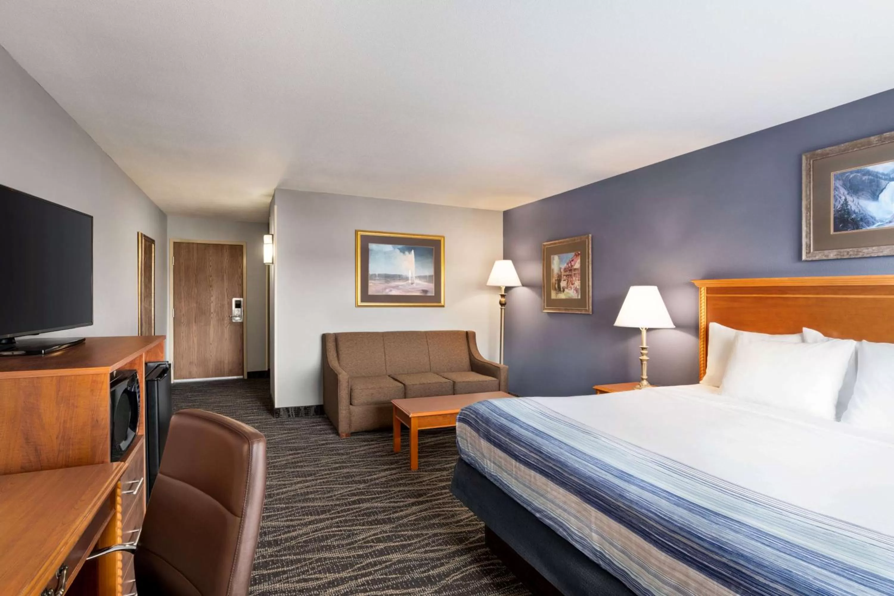 Photo of the whole room, Bed in AmericInn by Wyndham Laramie Near University of Wyoming