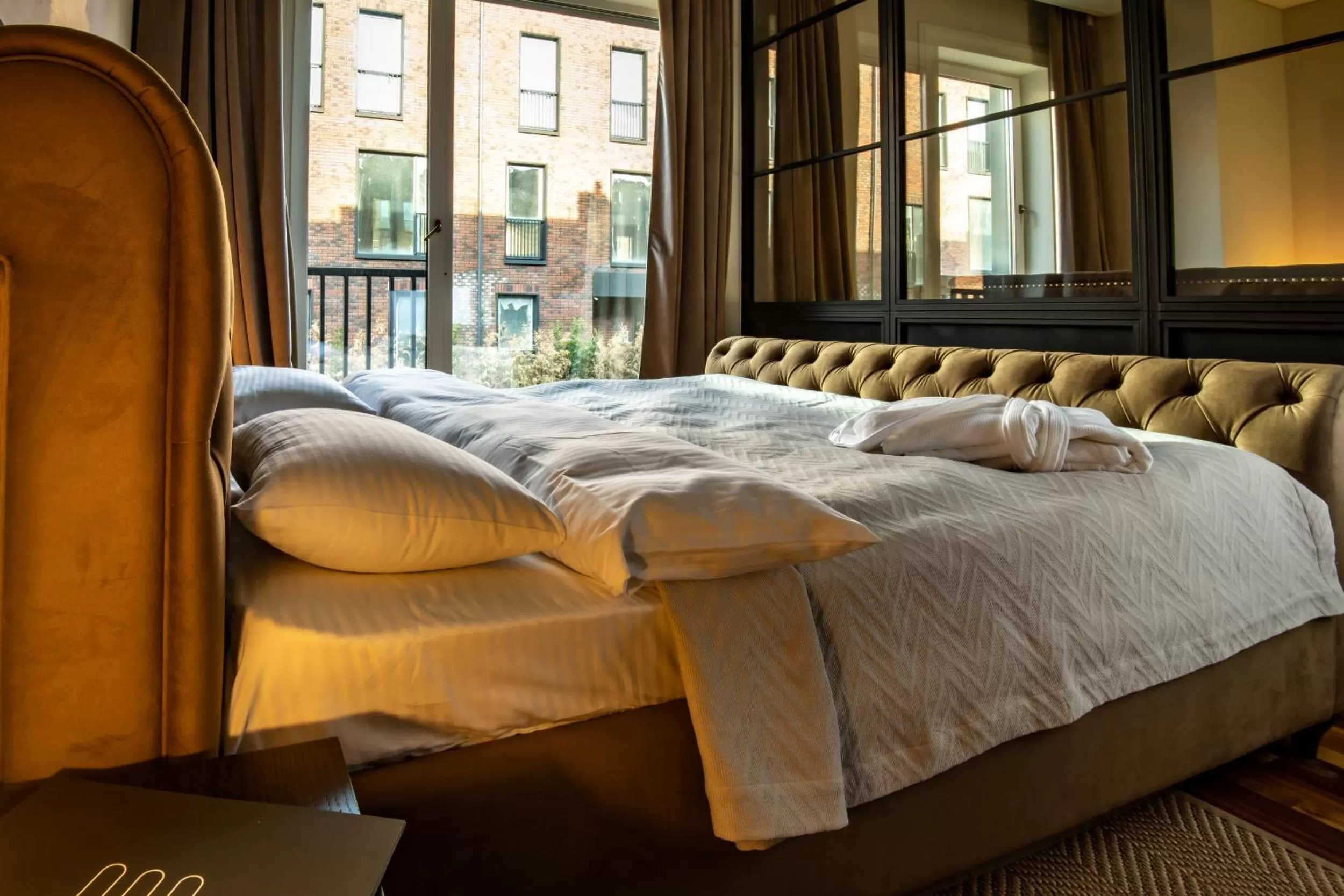 Bed in Warm House Apart Hotel