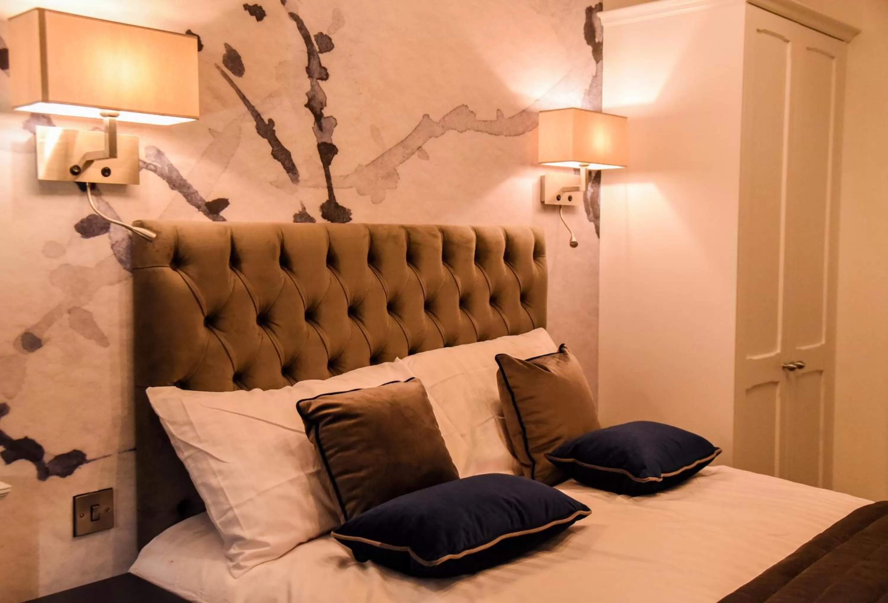 Bed in The Strand Hotel, the former residence of Oscar Wilde