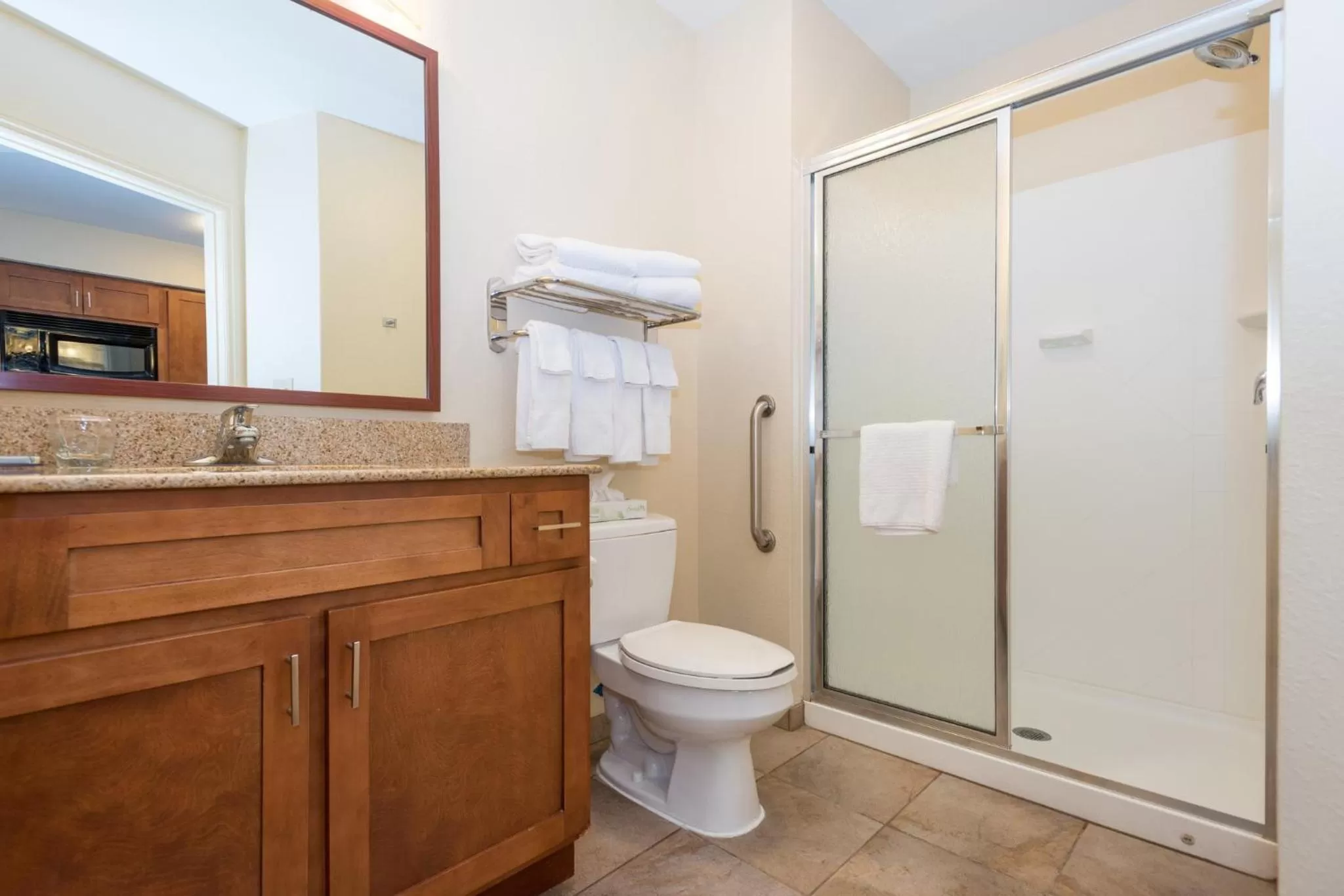 Bathroom in Candlewood Suites Mobile-Downtown by IHG
