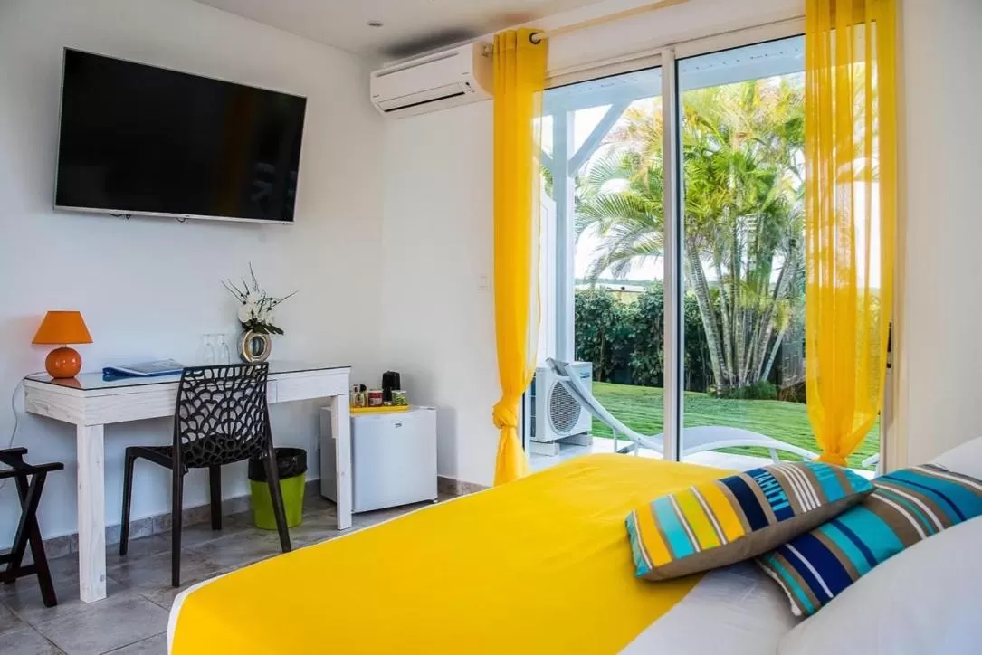 Bed in Hôtel La Christophine