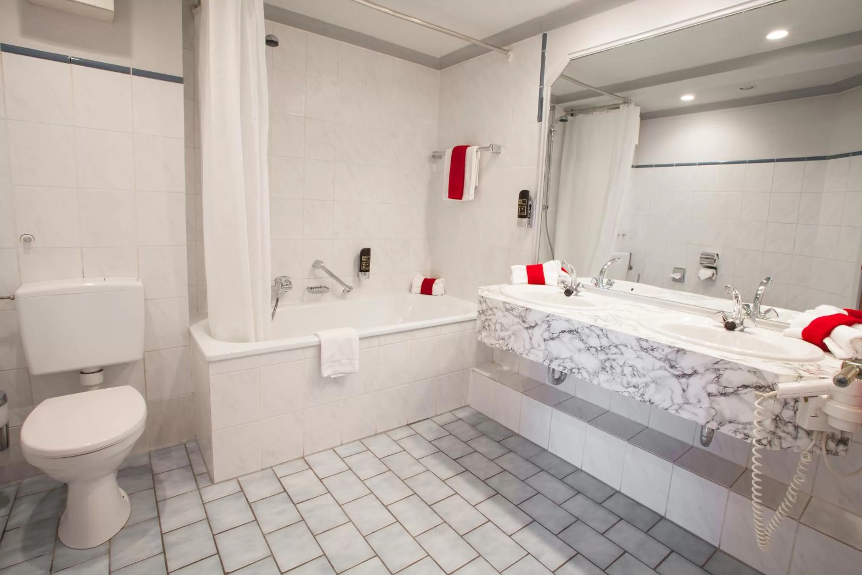 Bathroom in INA Hotel Royal