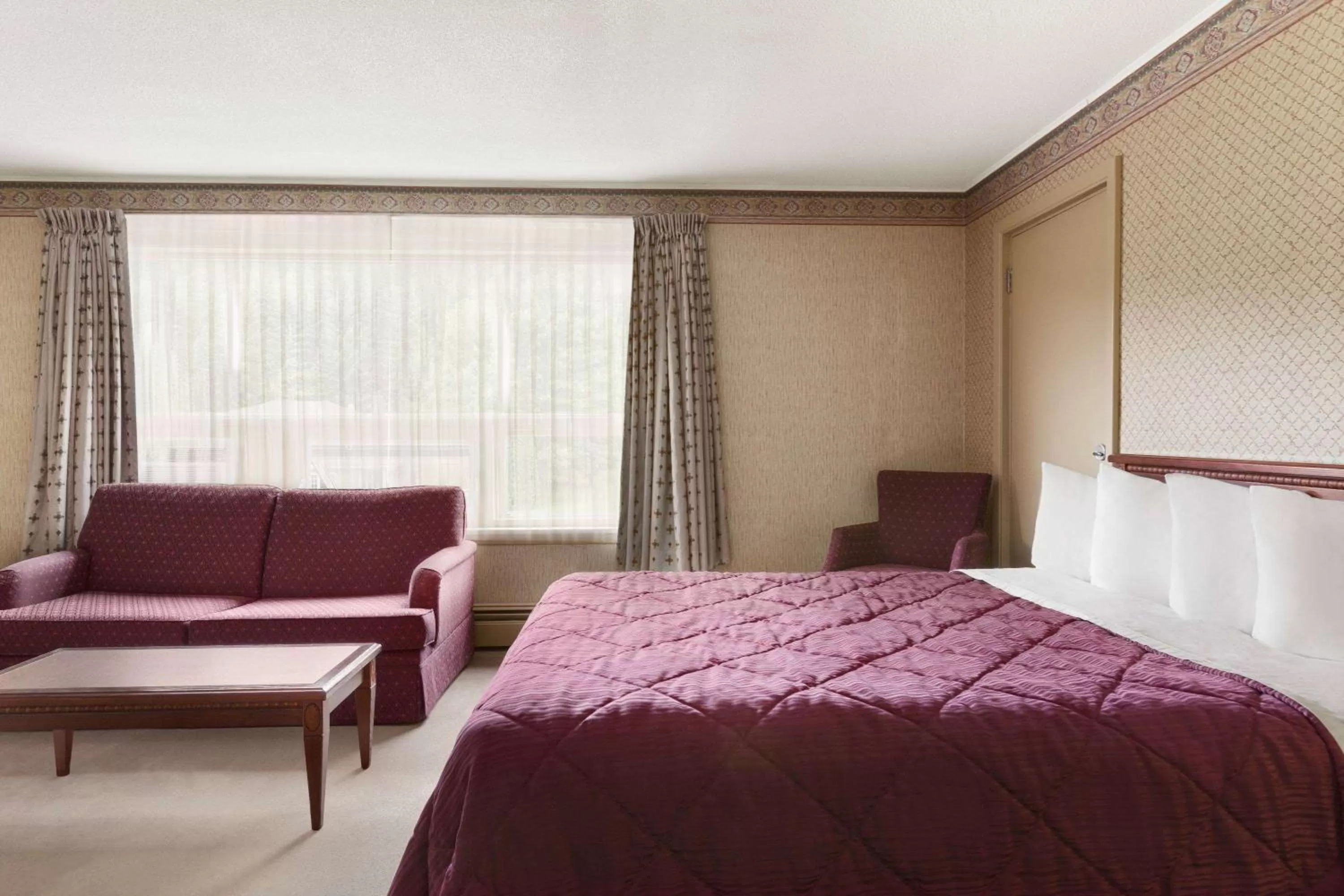 Bed in Travelodge by Wyndham Edmundston