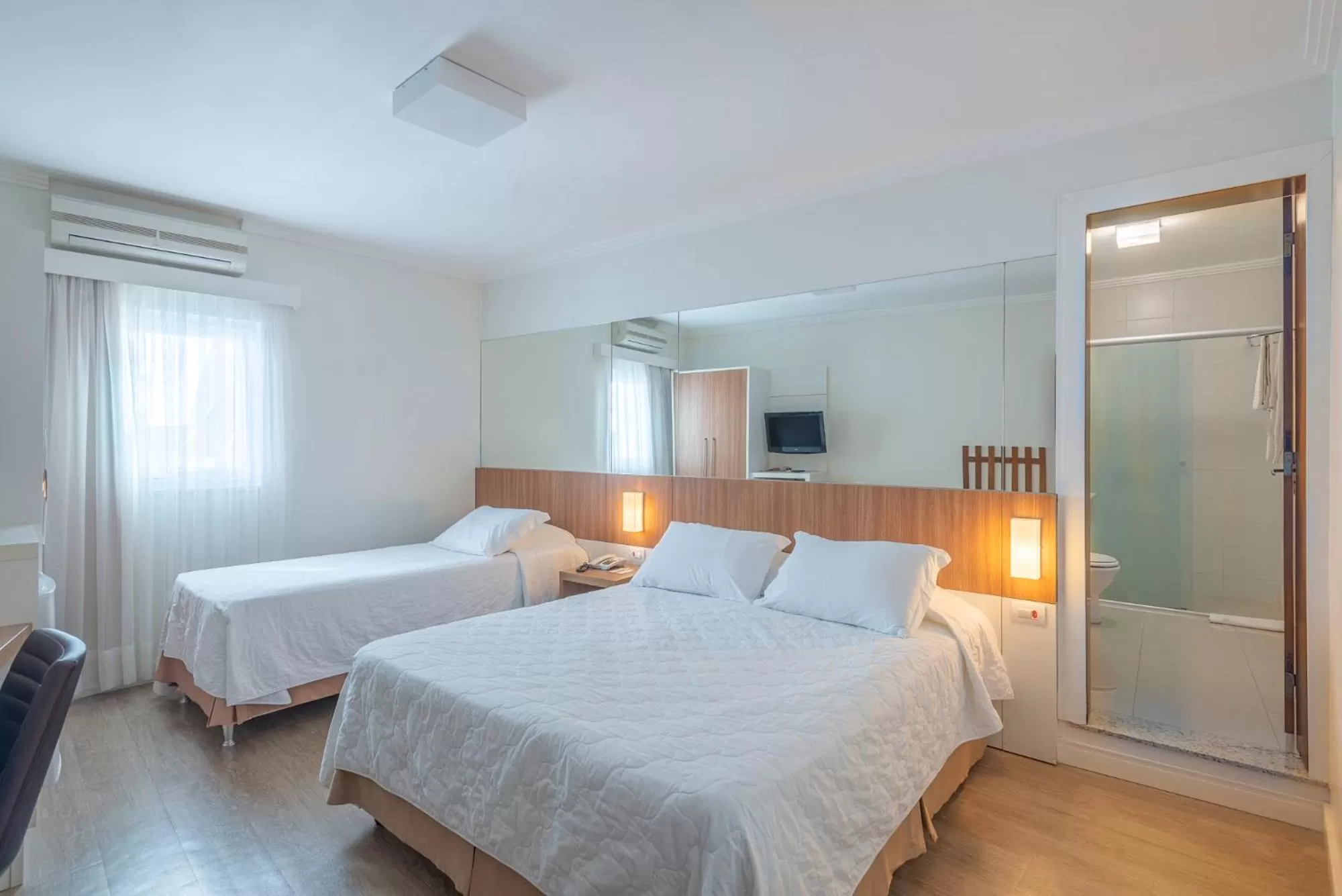 Bed in Hotel Glória