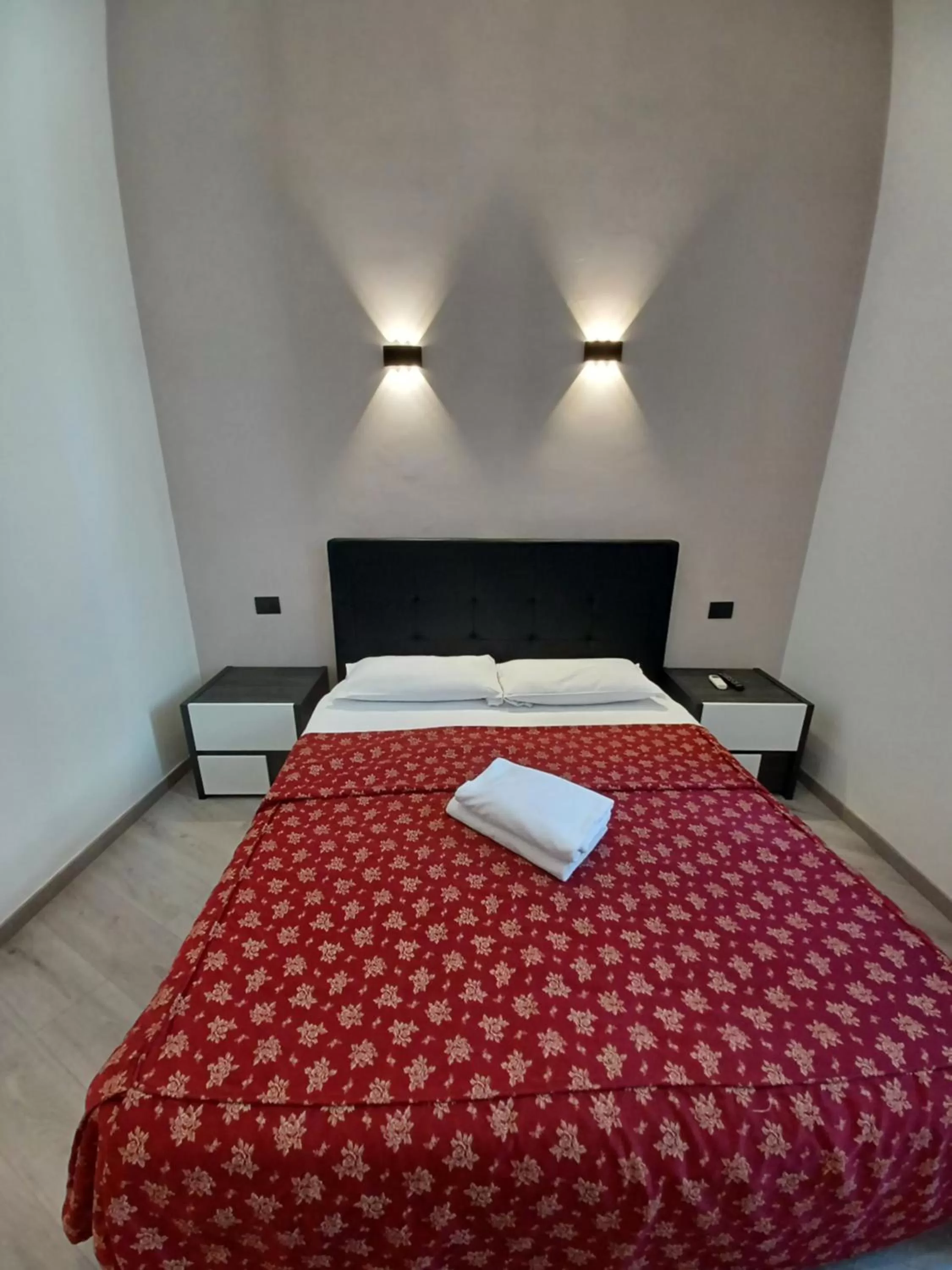 Bed in Hotel Mimosa Pantheon