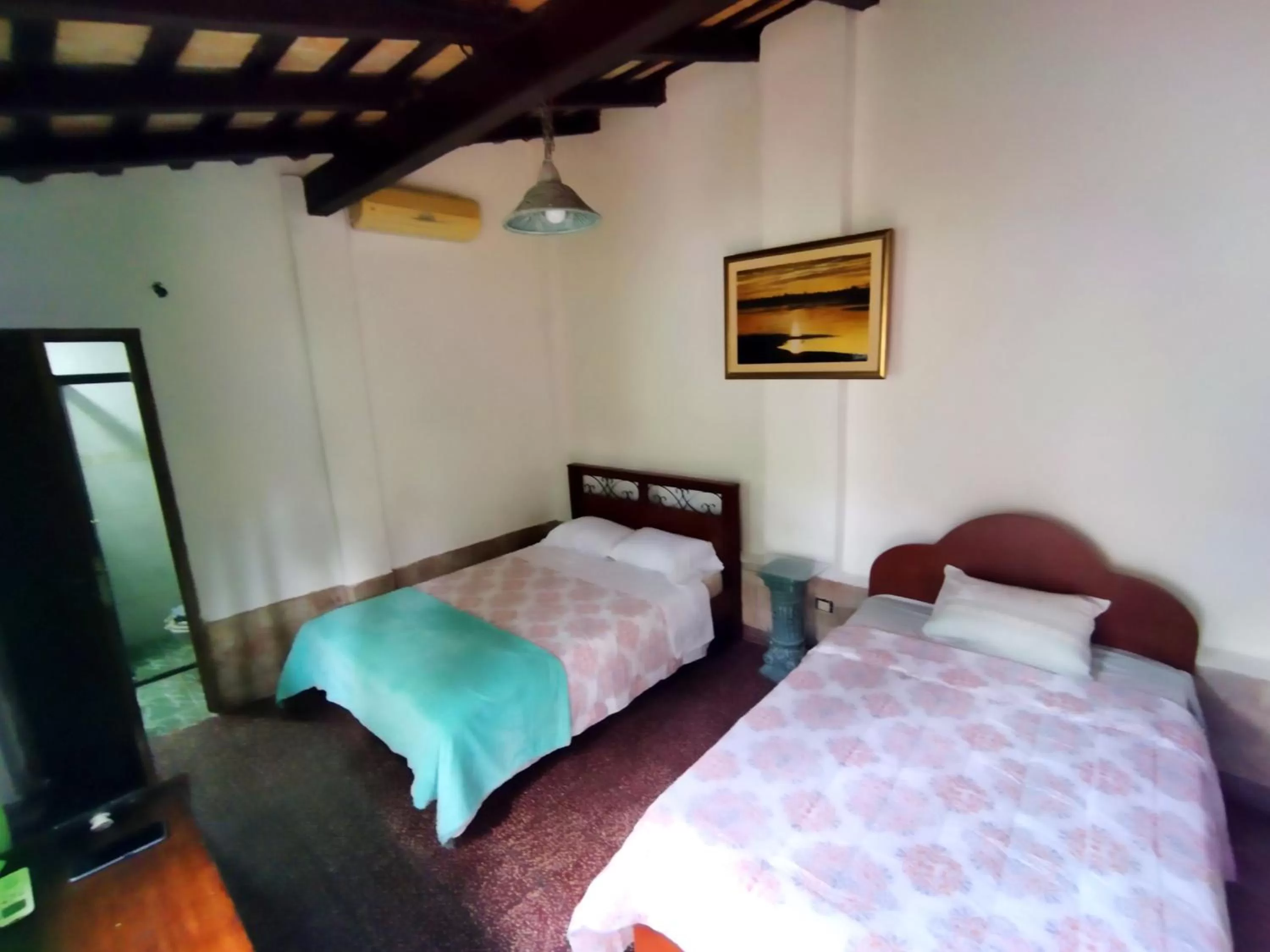 Bed in Hotel La Aparesida