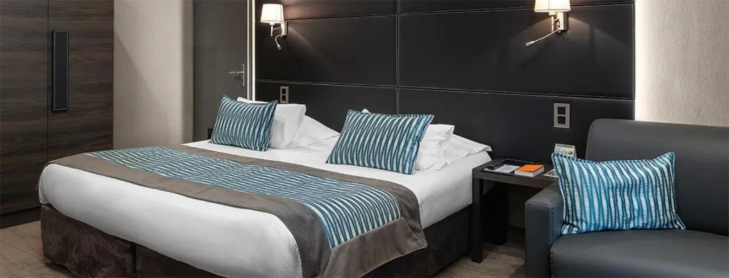 Bed in Le Grand Hotel & Spa