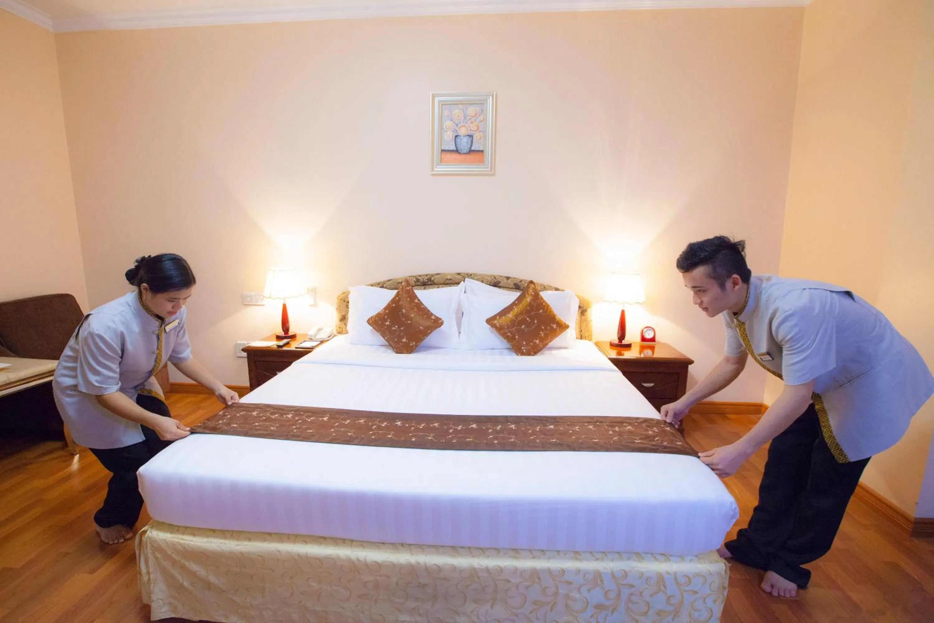 Bed in Grand Palace Hotel