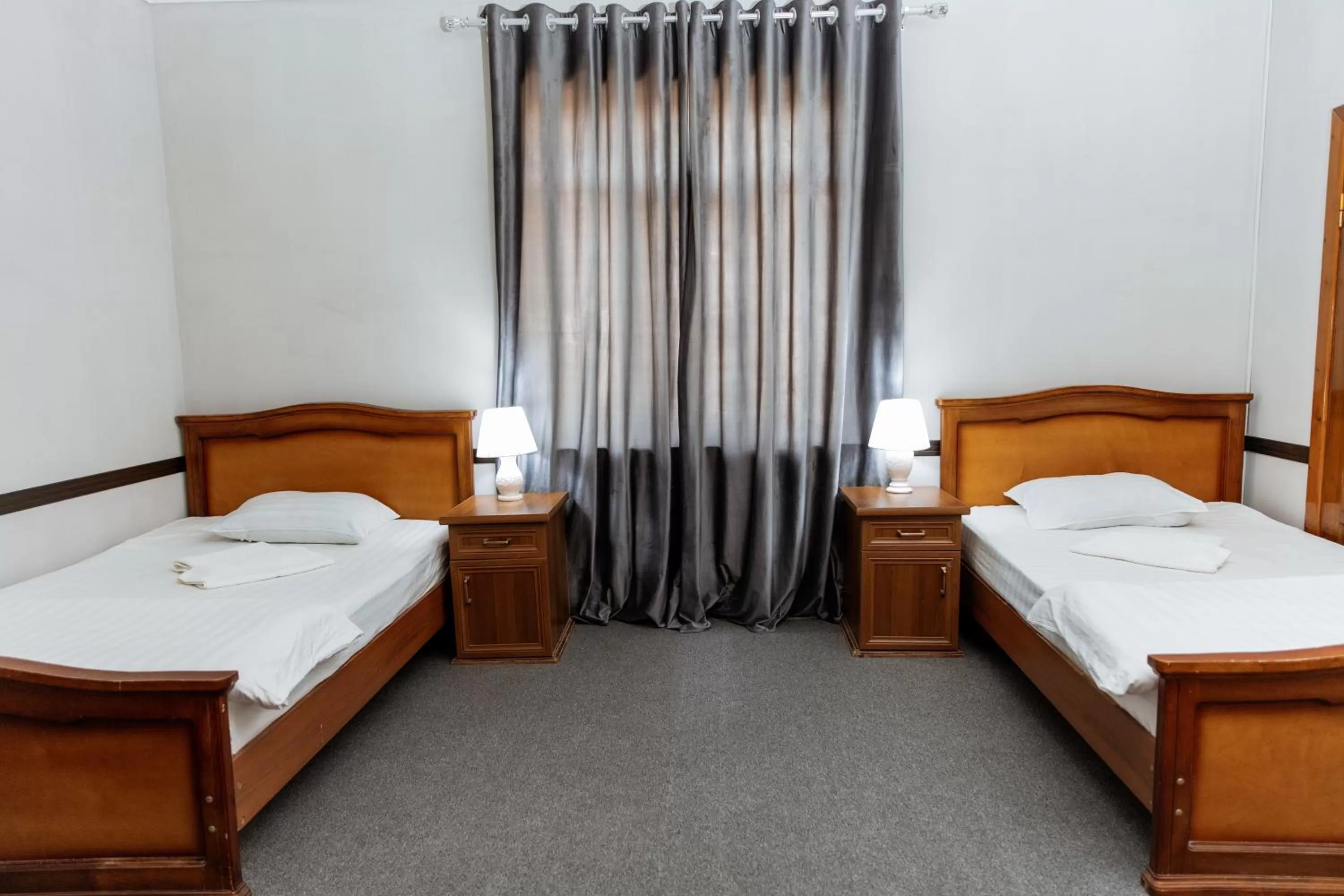 Photo of the whole room, Bed in Stella Hotel Tashkent