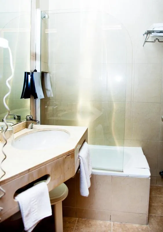 Bathroom in Hotel Universal by Maxi Hoteles