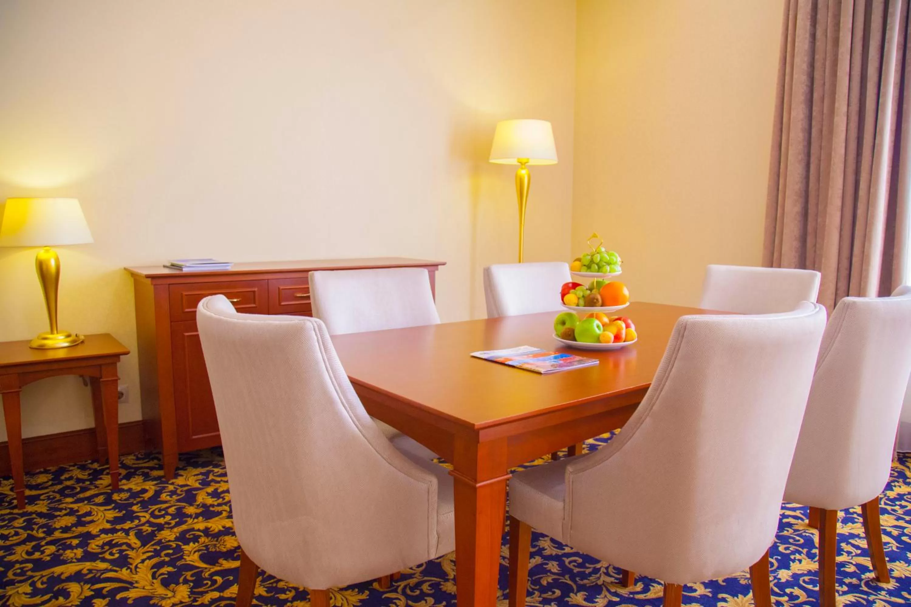 Living room in Ramada by Wyndham Almaty