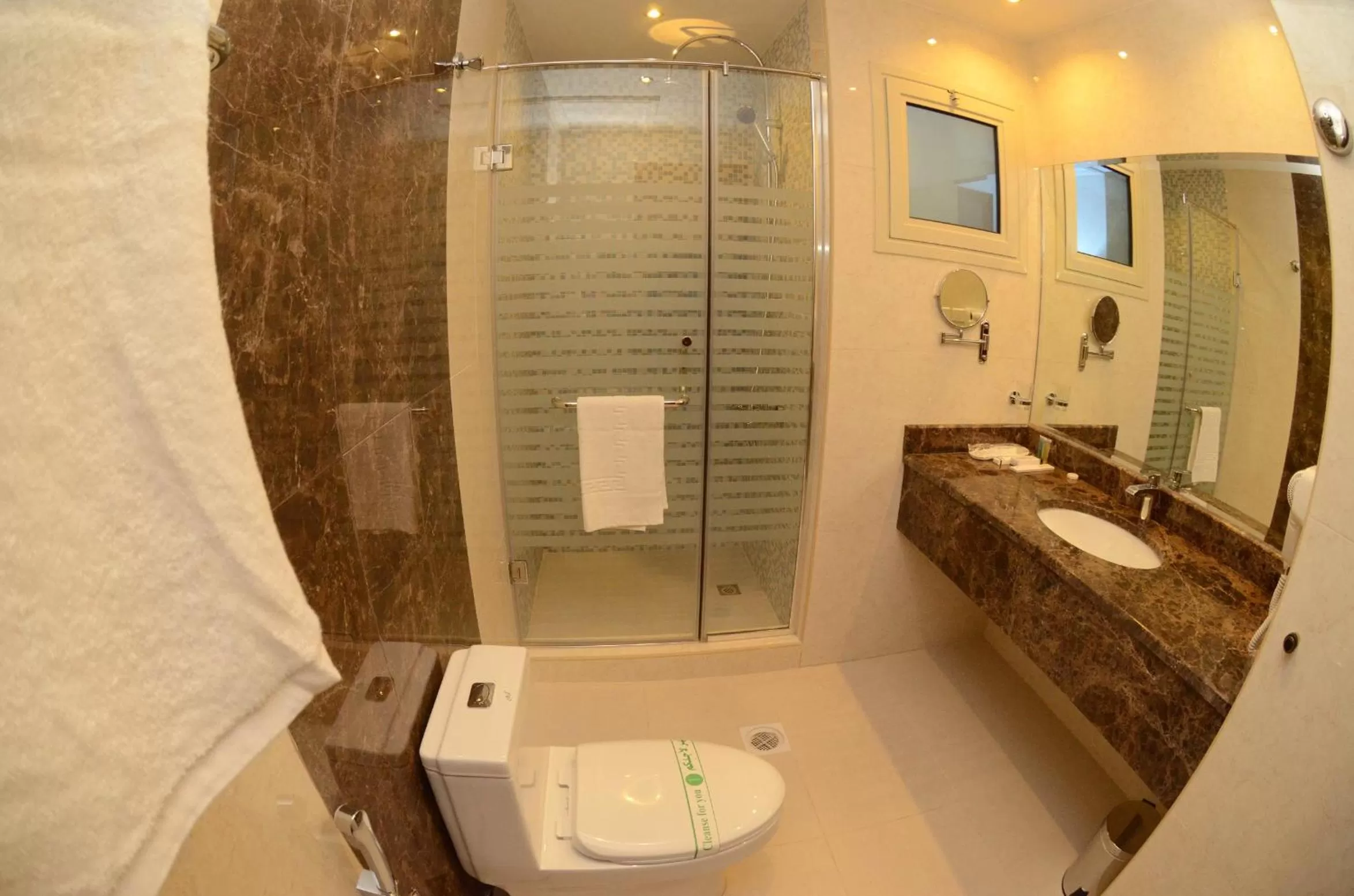 On site, Bathroom in Abat Suites