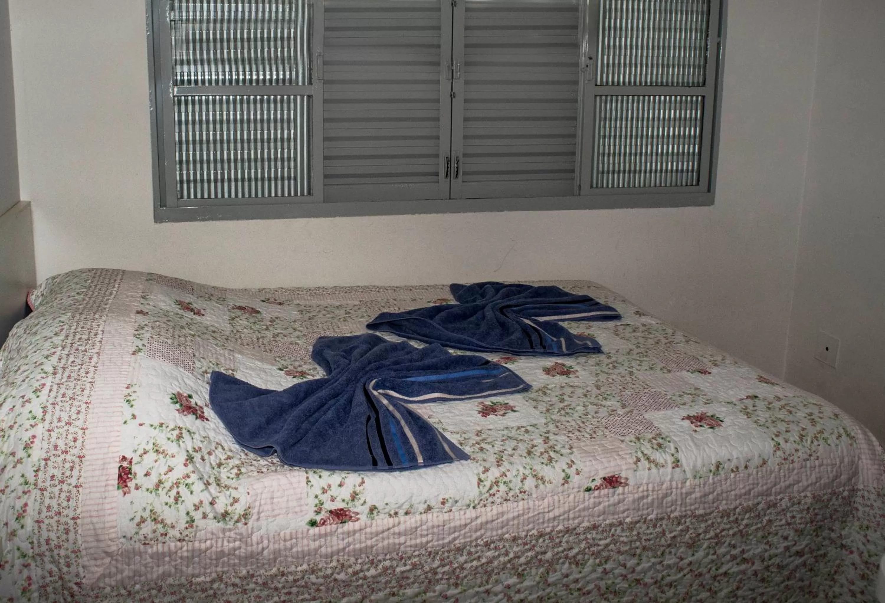 Bed in Pousada Araxá