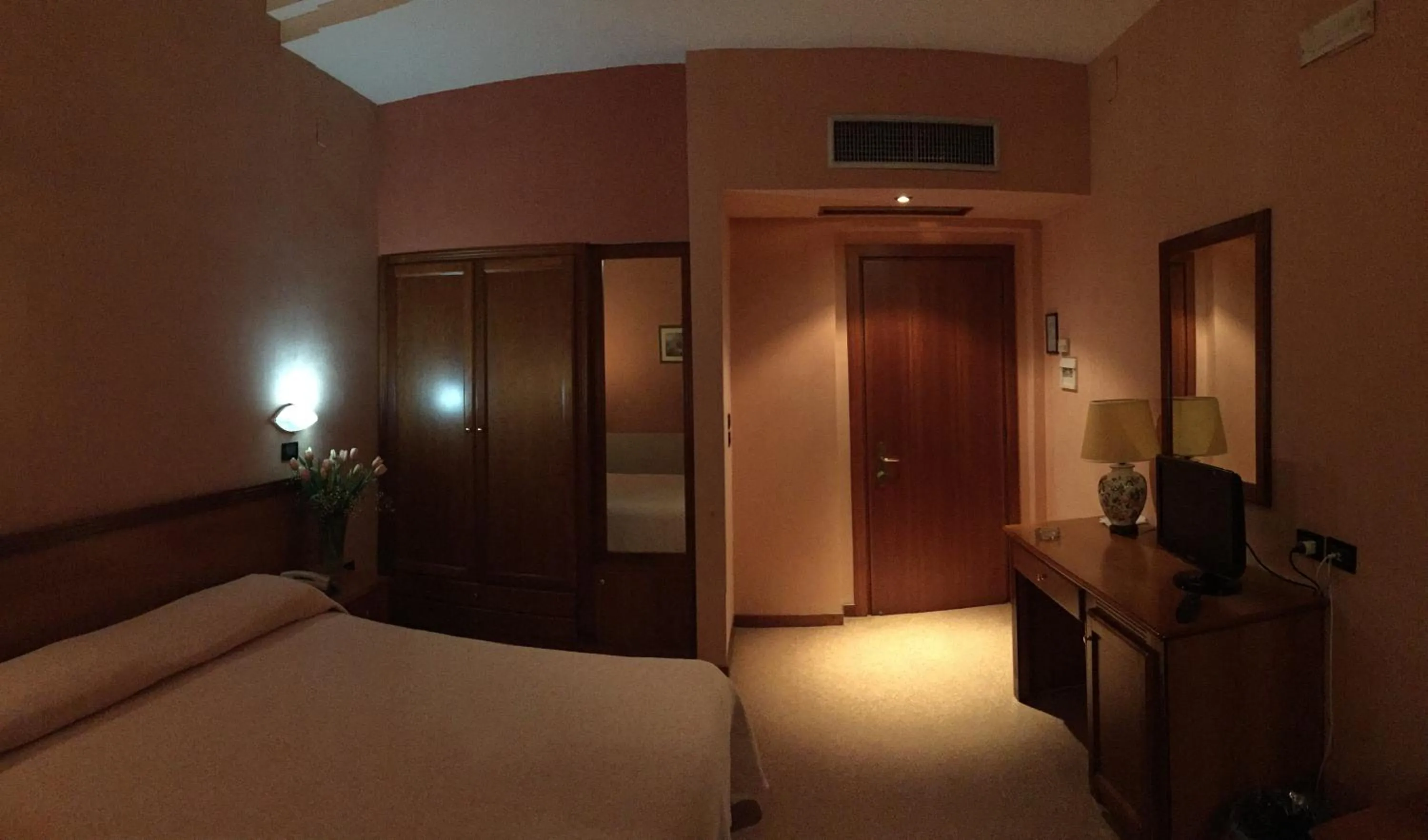Bedroom in Hotel Giardino degli Aranci