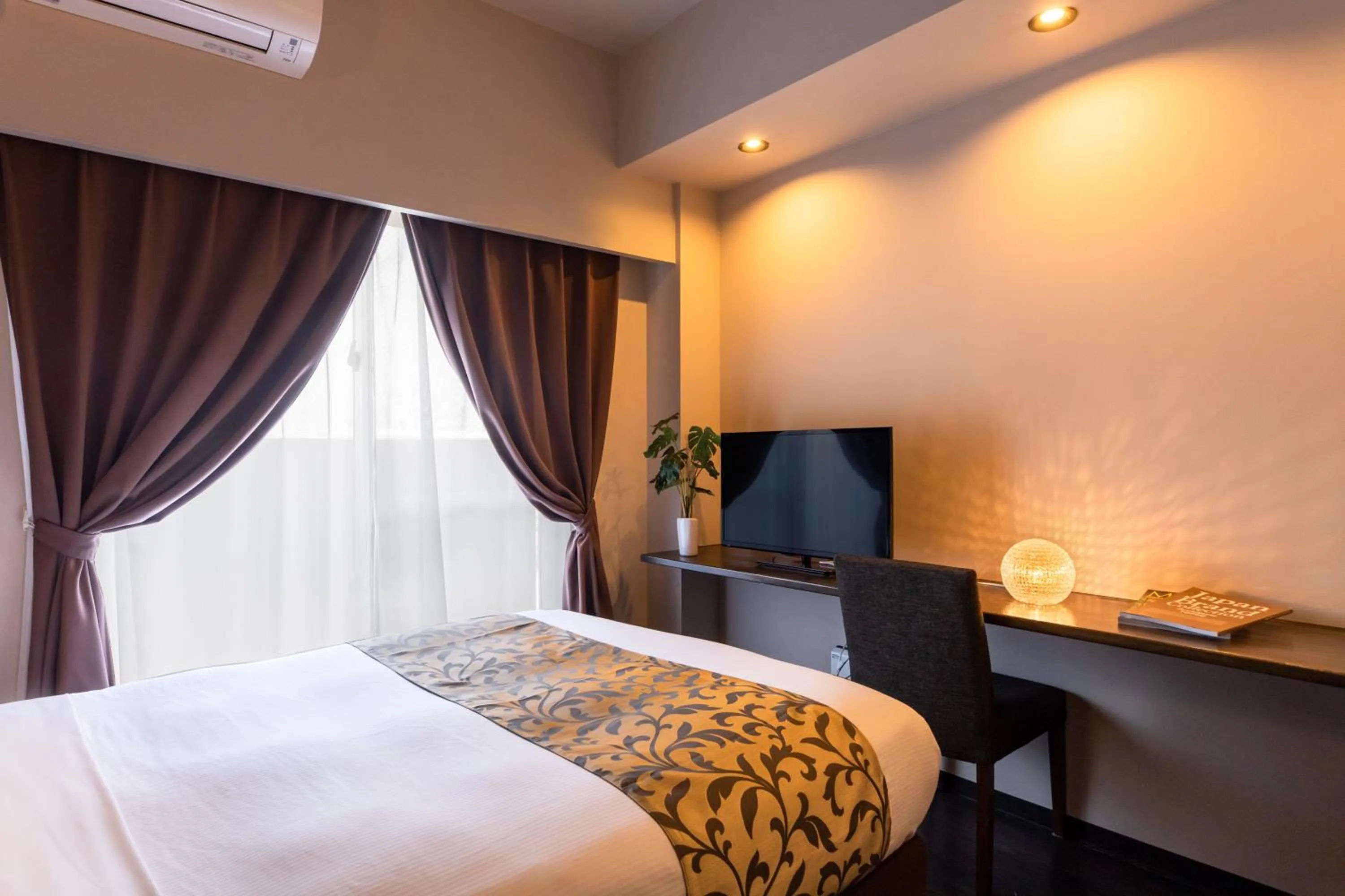 Bed in Mr.KINJO in SAKAEMACHI